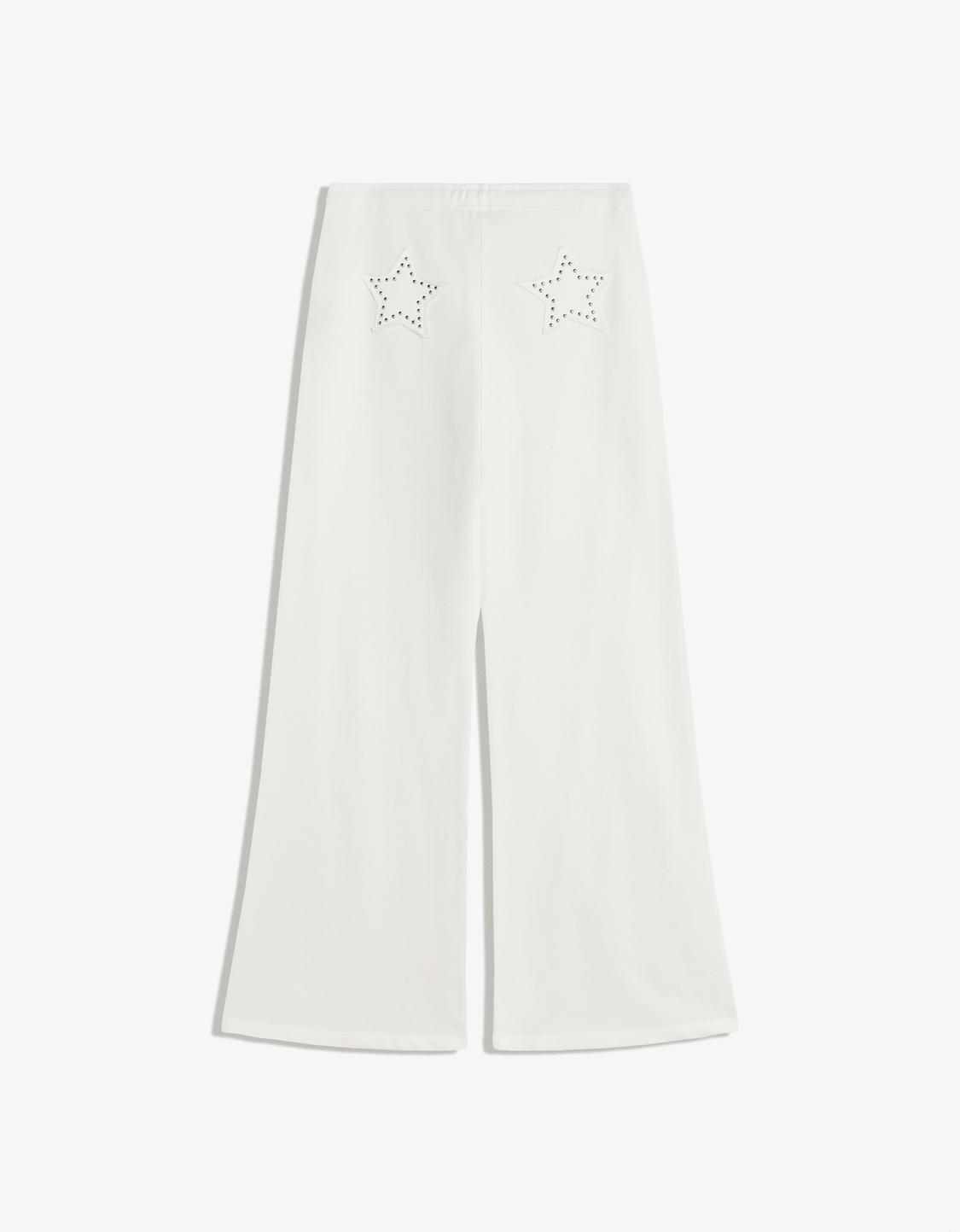 Plush trousers with studs