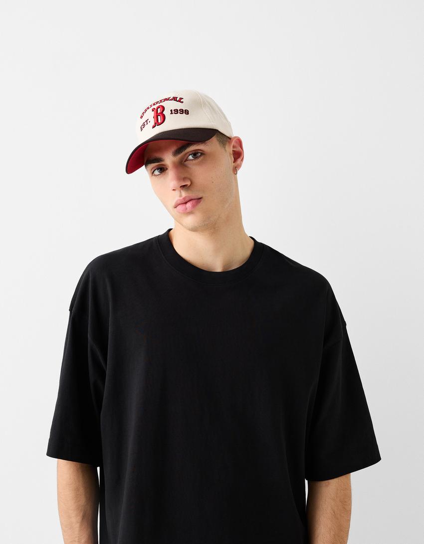 كاب جامعي مطرز-كريمي-1