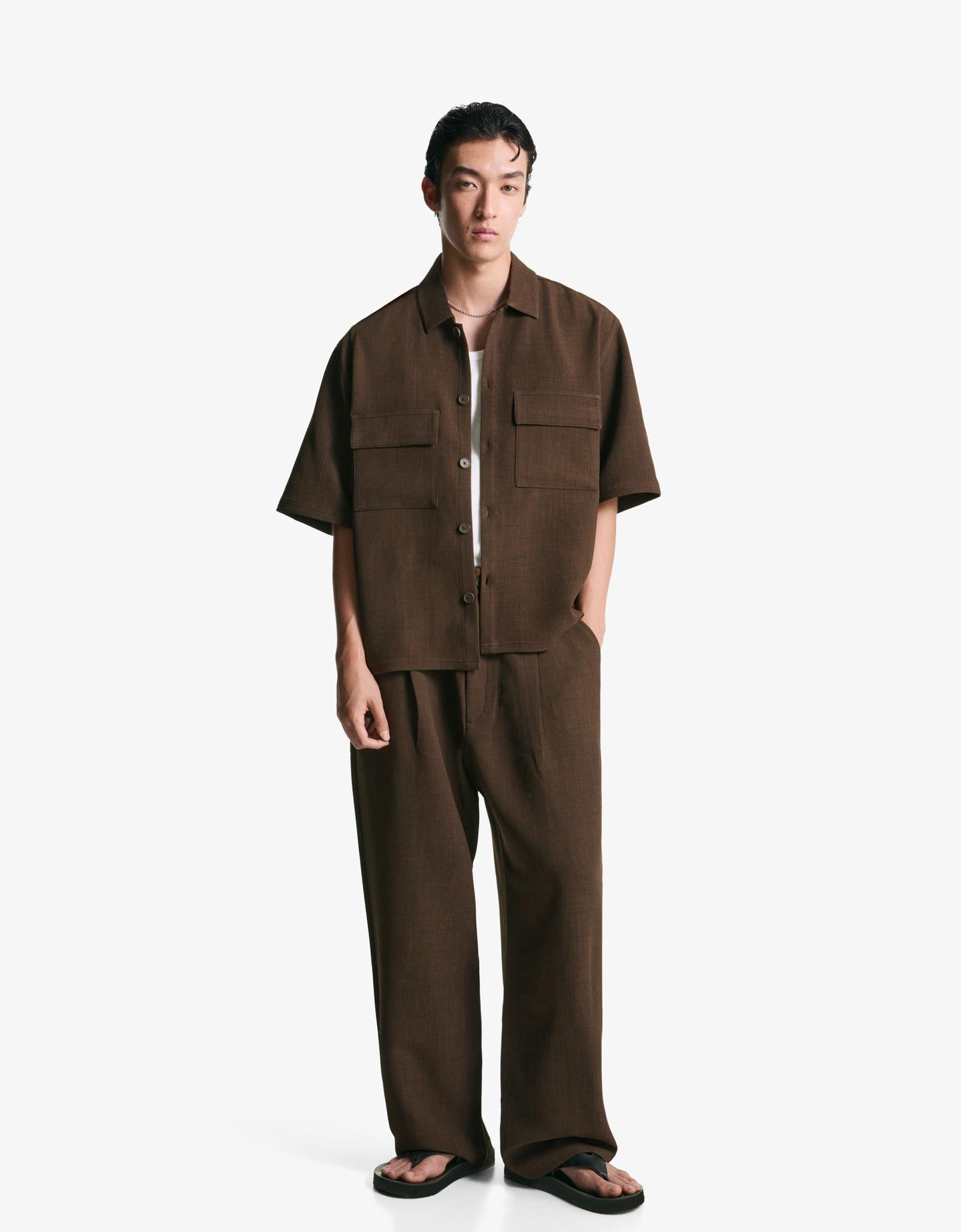 Bershka spodnie superbaggy tailoring brązowy
