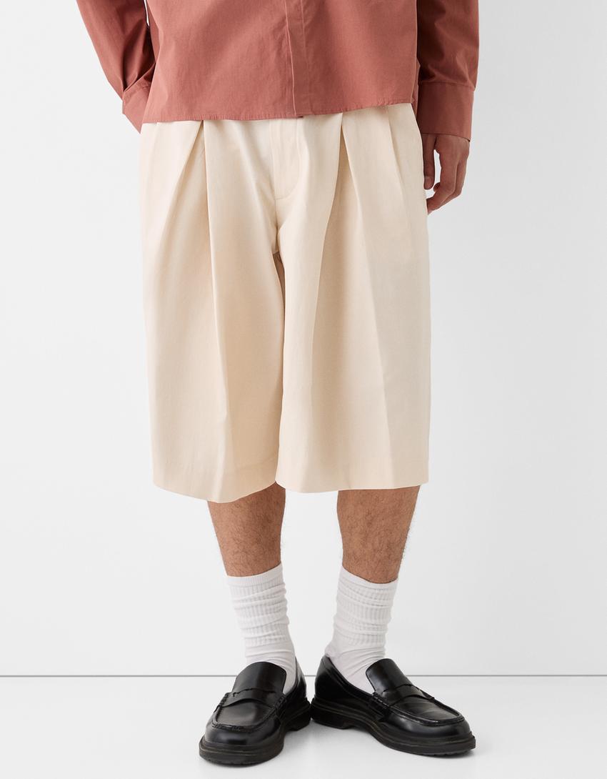 برمودا شورت بساق عريضة وثنيات-كريمي-1