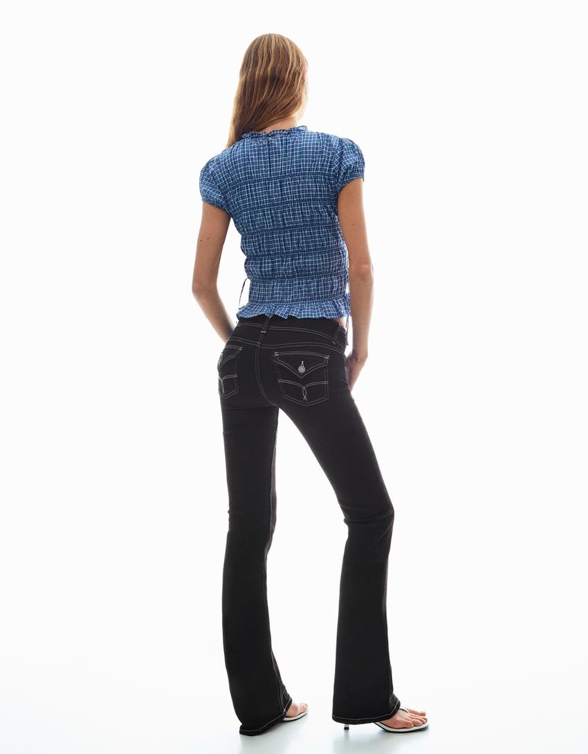 Jeans bootcut tiro bajo flaps-Gris