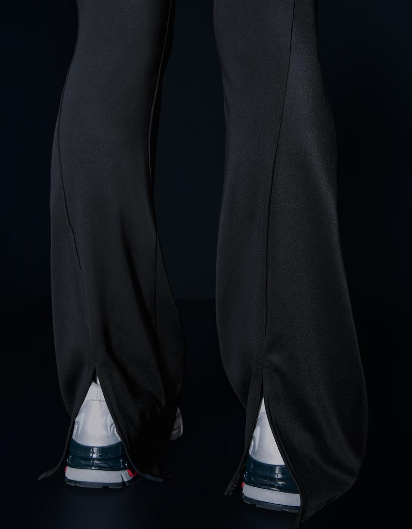 Nefes Alabilir & Hızlı Kuruyan teknik kumaşlı flare fit pantolon-Siyah