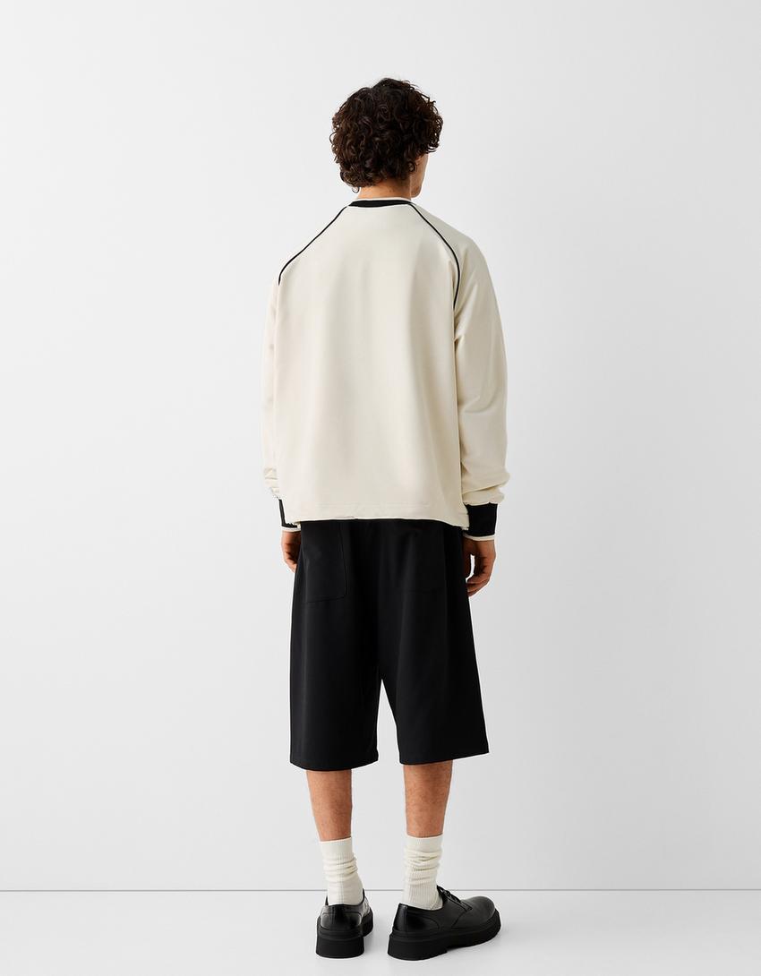 سويت شيرت بطبعة-أبيض مطفي-1