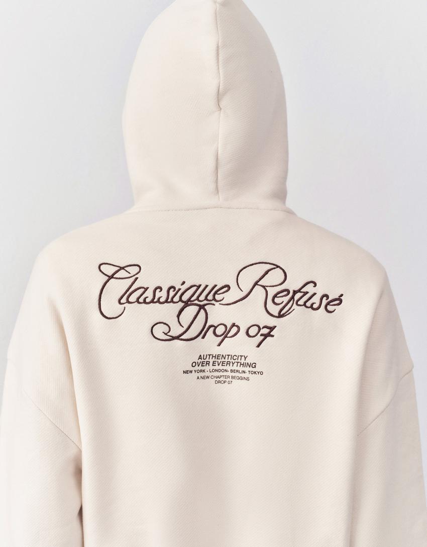 Hoodie met geborduurde print-Ecru