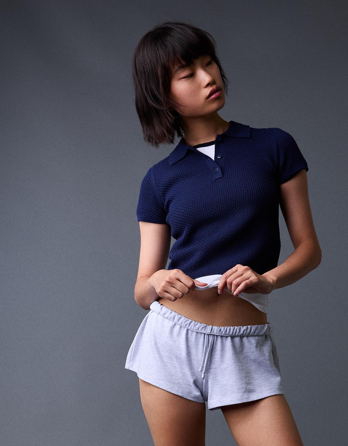 Textured polo collar short sleeve sweater