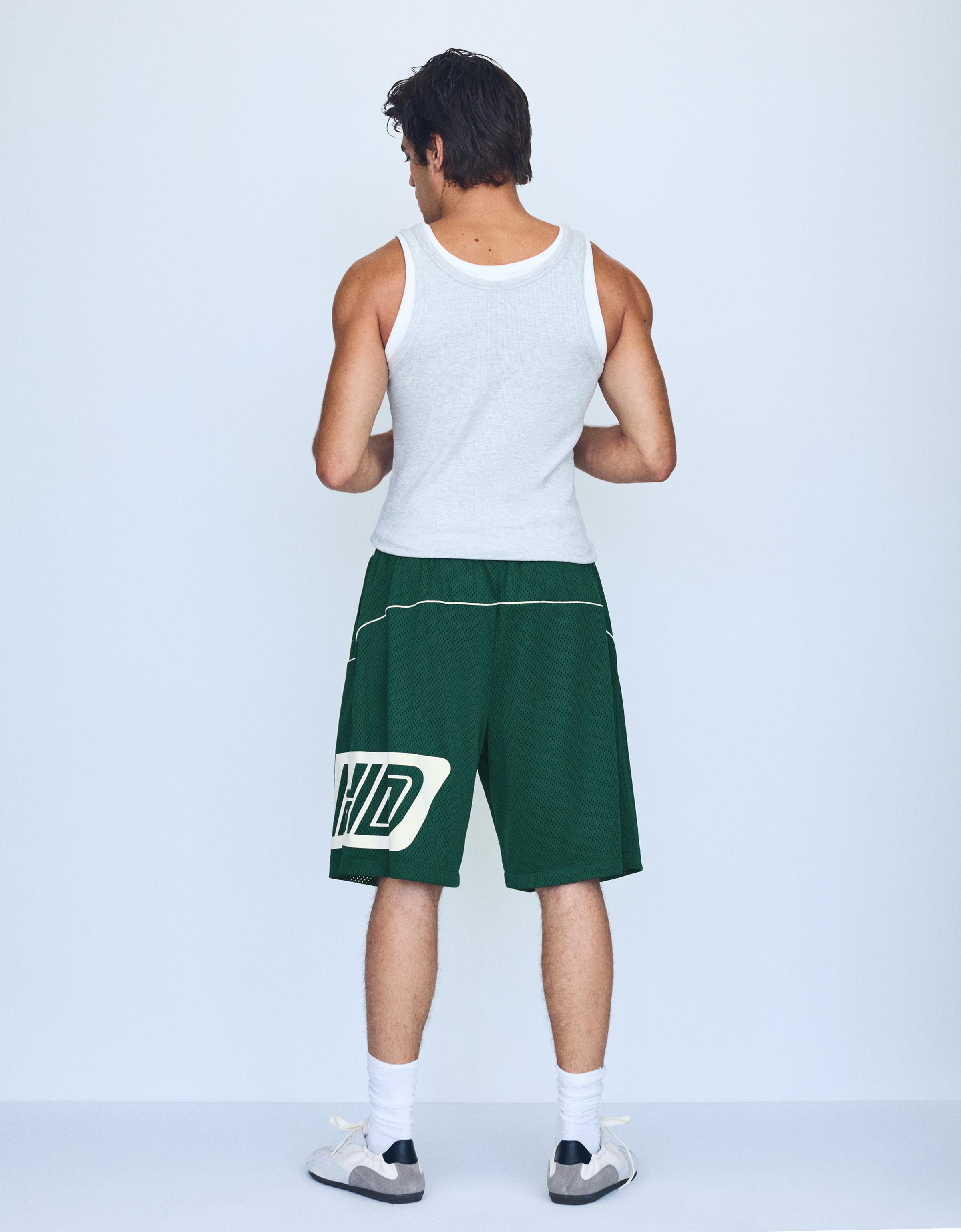 Contrast print mesh Bermuda shorts — Green