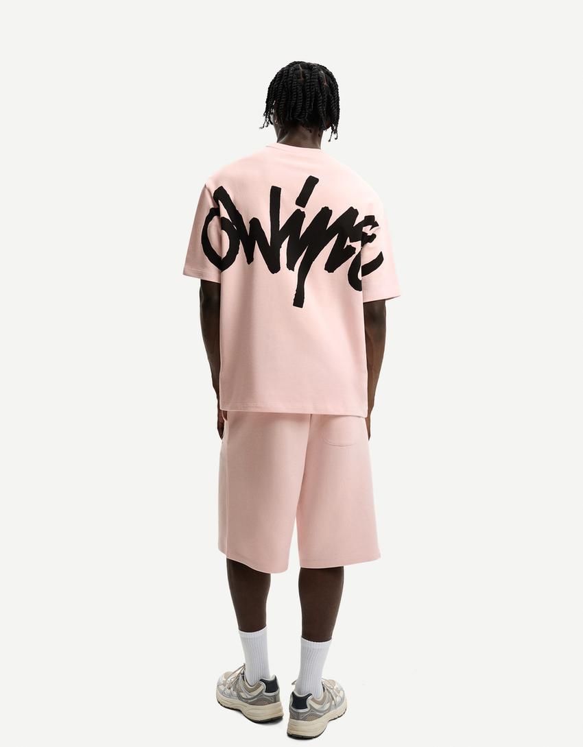 Plush Bermuda shorts with print-Pink-1