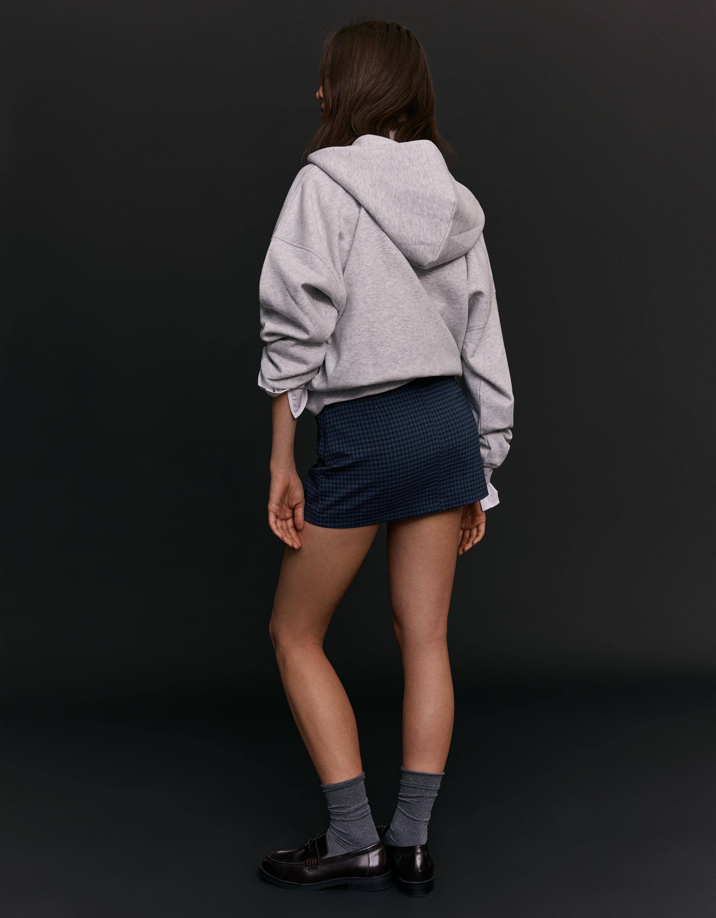 Mini skort with buckle