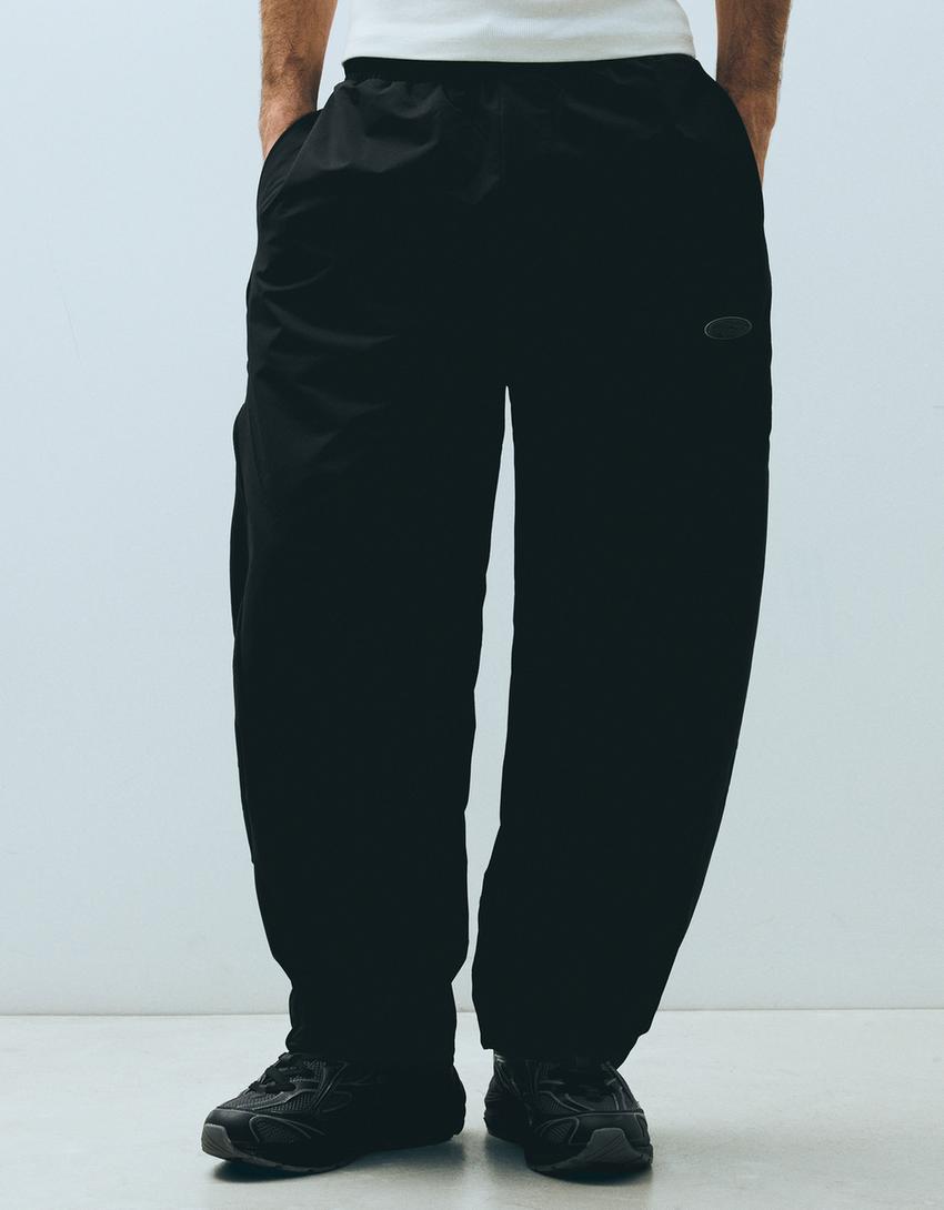 Technical barrel trousers-Black