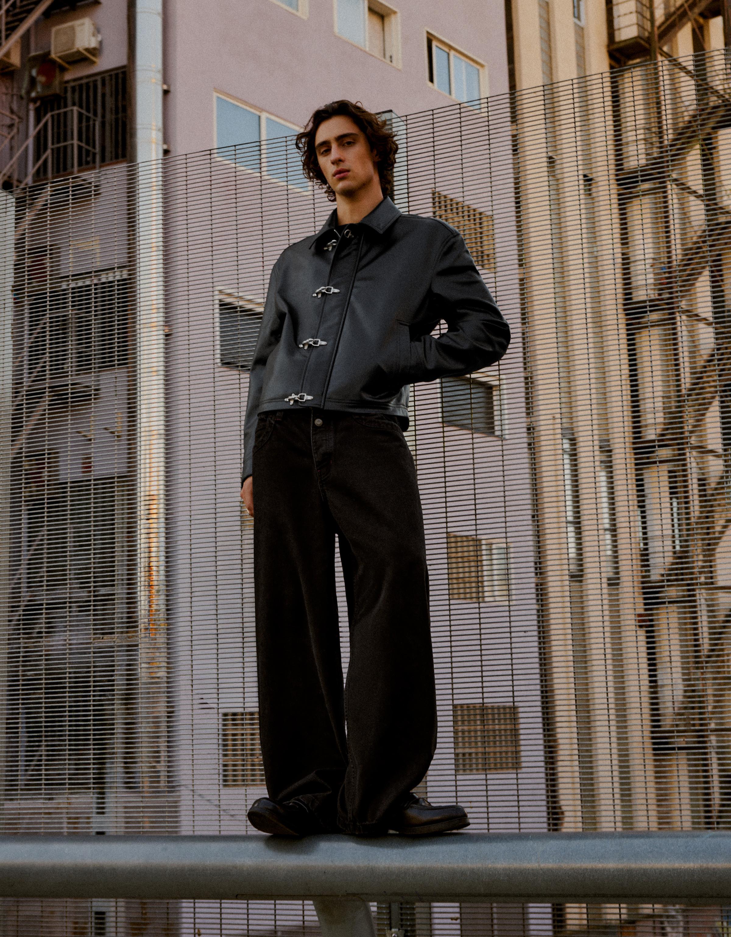 Leather effect jacket with clasps — Black