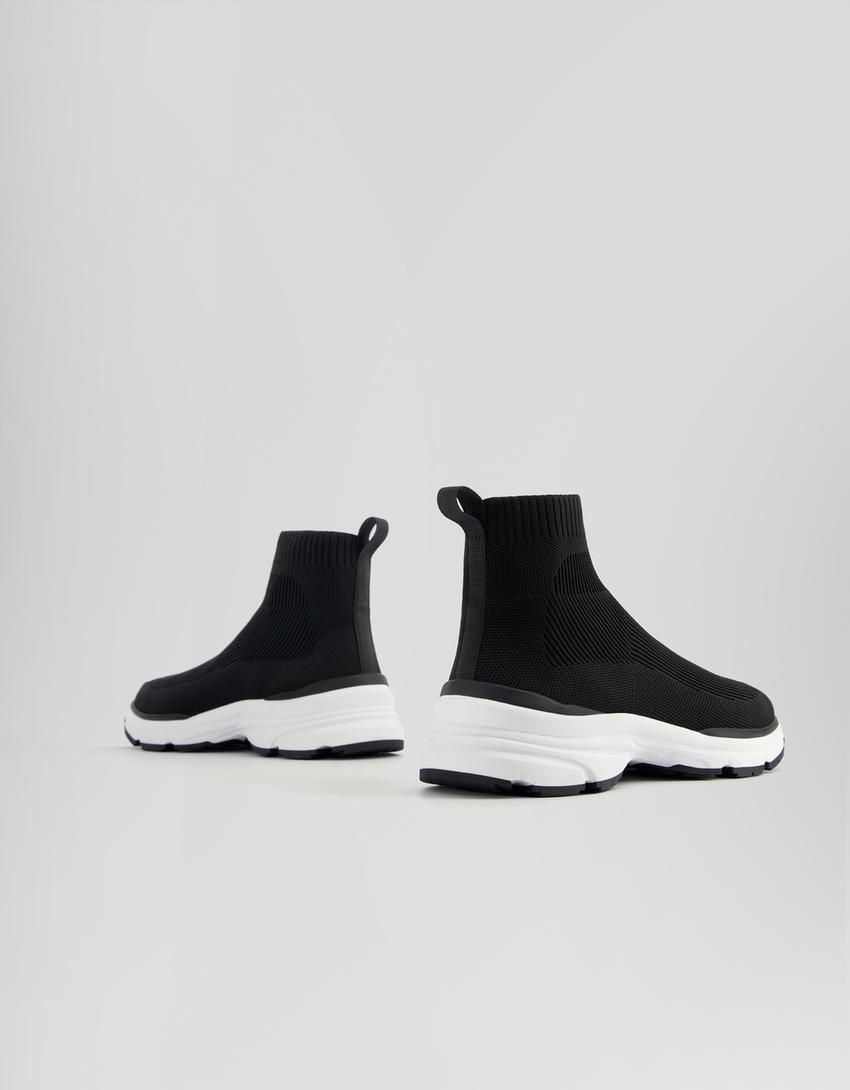 حذاء رياضي برقبة عالية من قماش محاك-أسود