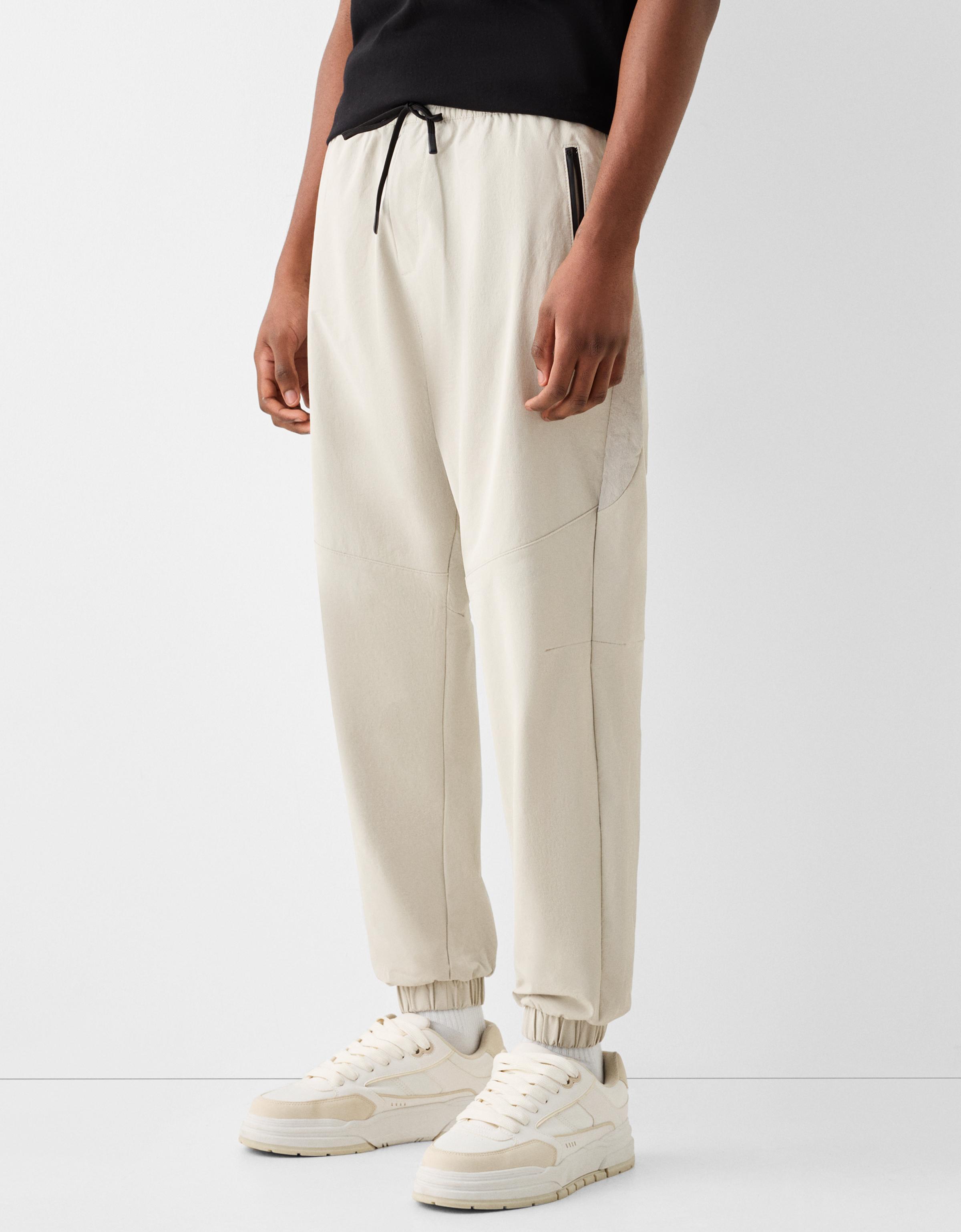 Technical jogging trousers Men Bershka