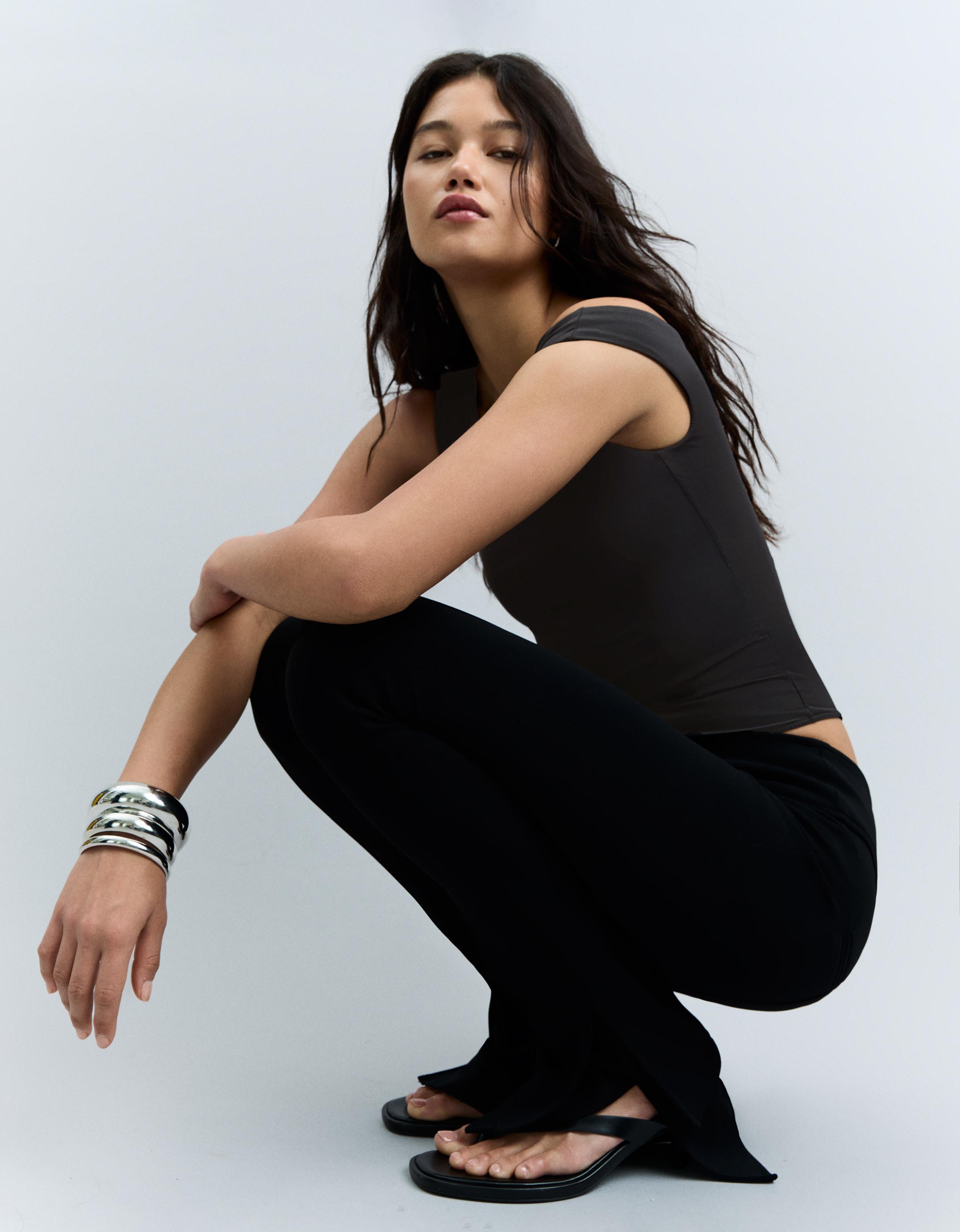 Asymmetric ruched strap bodysuit