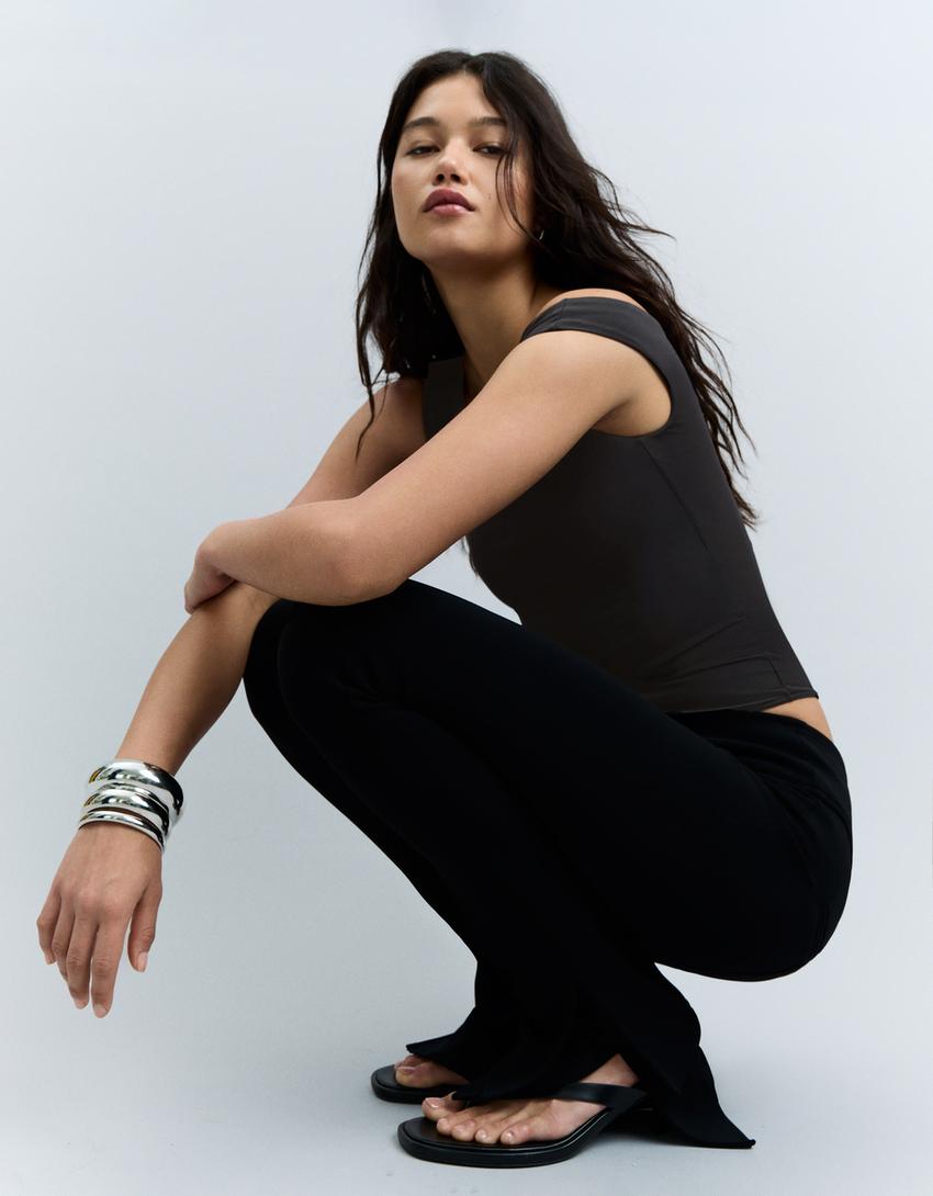 Body asimmetrico con spalline arricciate-Nero