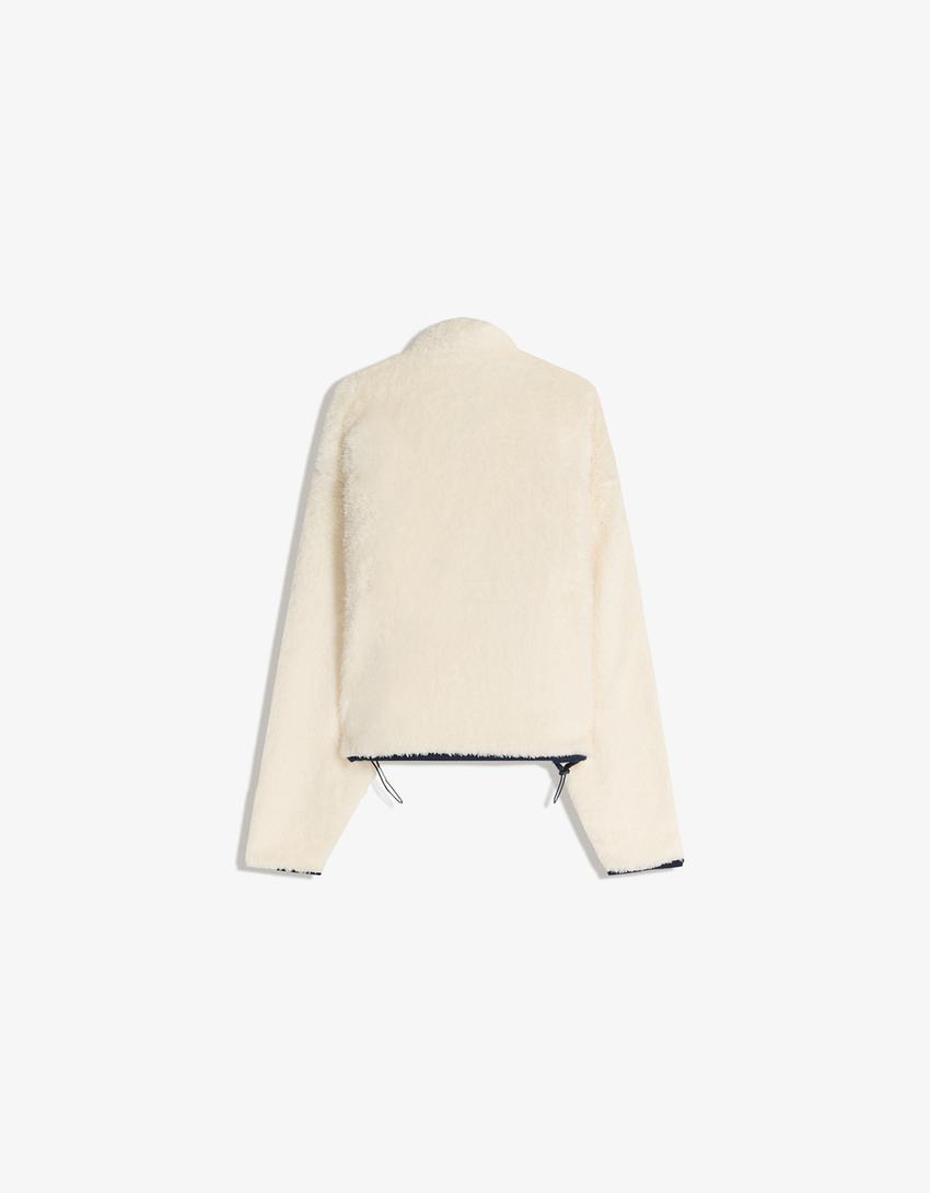 Camisola com zíper efeito de pele de carneiro barra ajustável-Cru