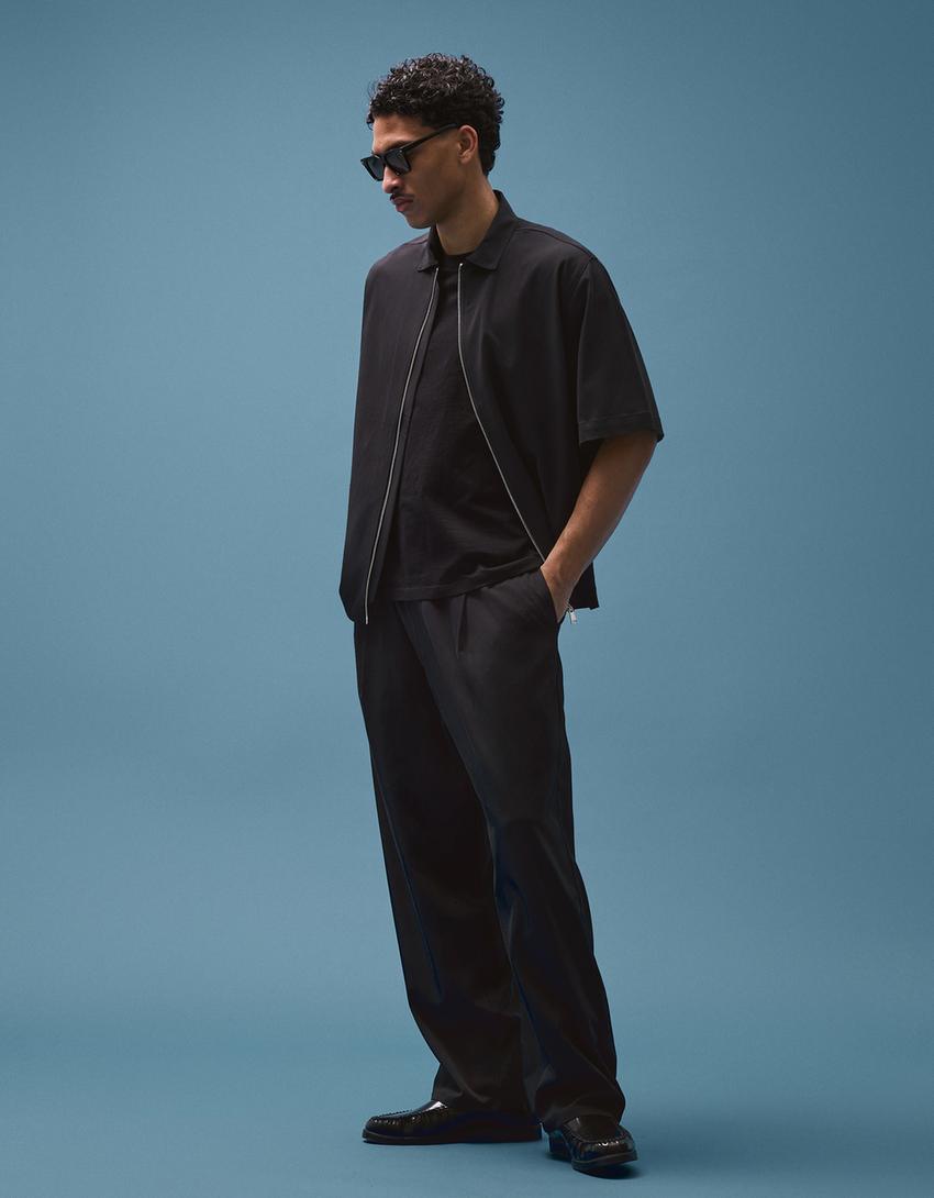 Super baggy flowing trousers with darts - Pants - Men | Bershka Super baggy flowing trousers with darts - Pants - Men | Bershka