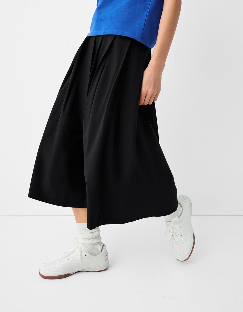 تنورة ميدي بكسرات وقصة محبوكة وحزام-أسود-3