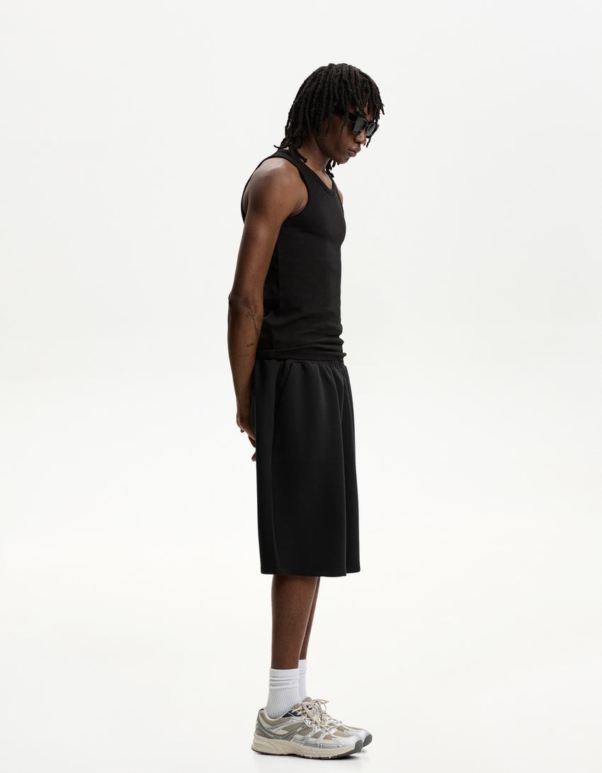 Oversize neoprene-effect Bermuda shorts-Black