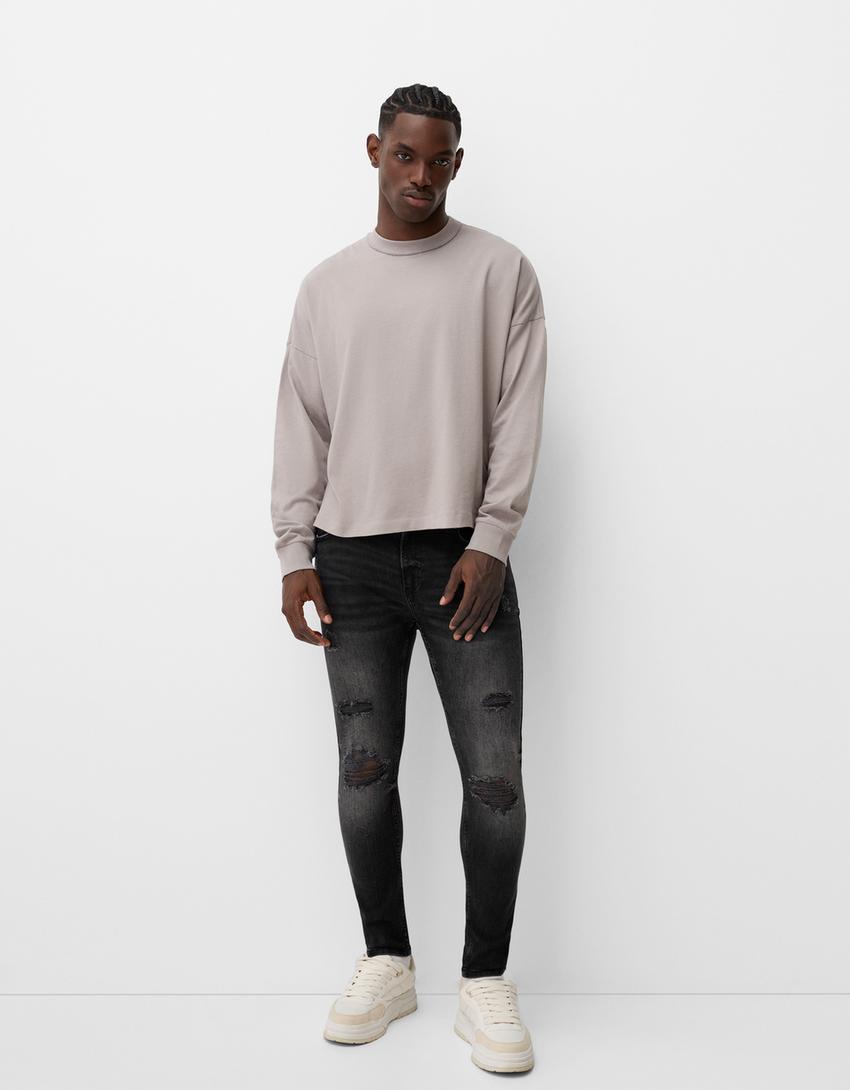 Super Skinny Jeans mit Rissen-Schwarz