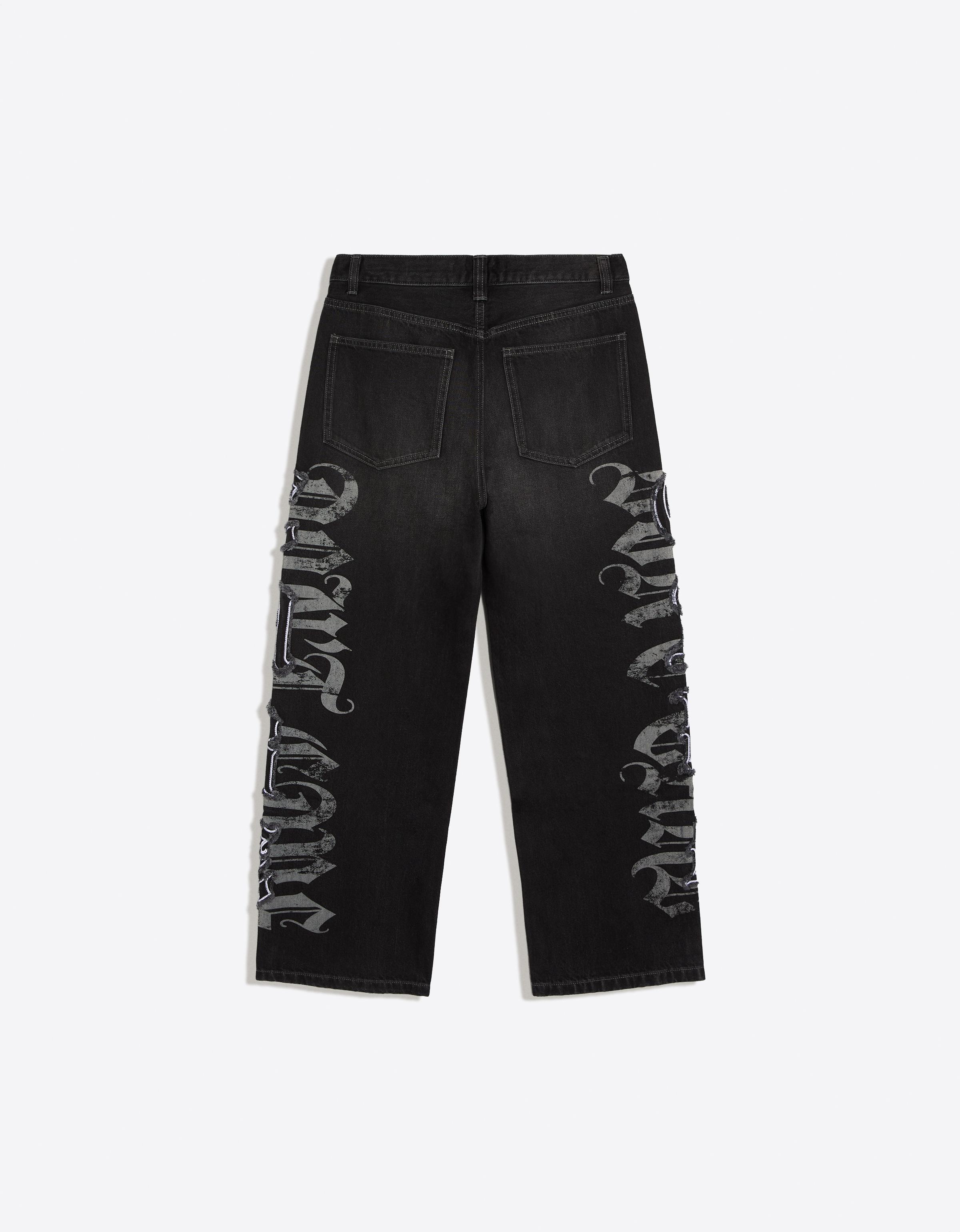Baggy jeans with star patches — Black