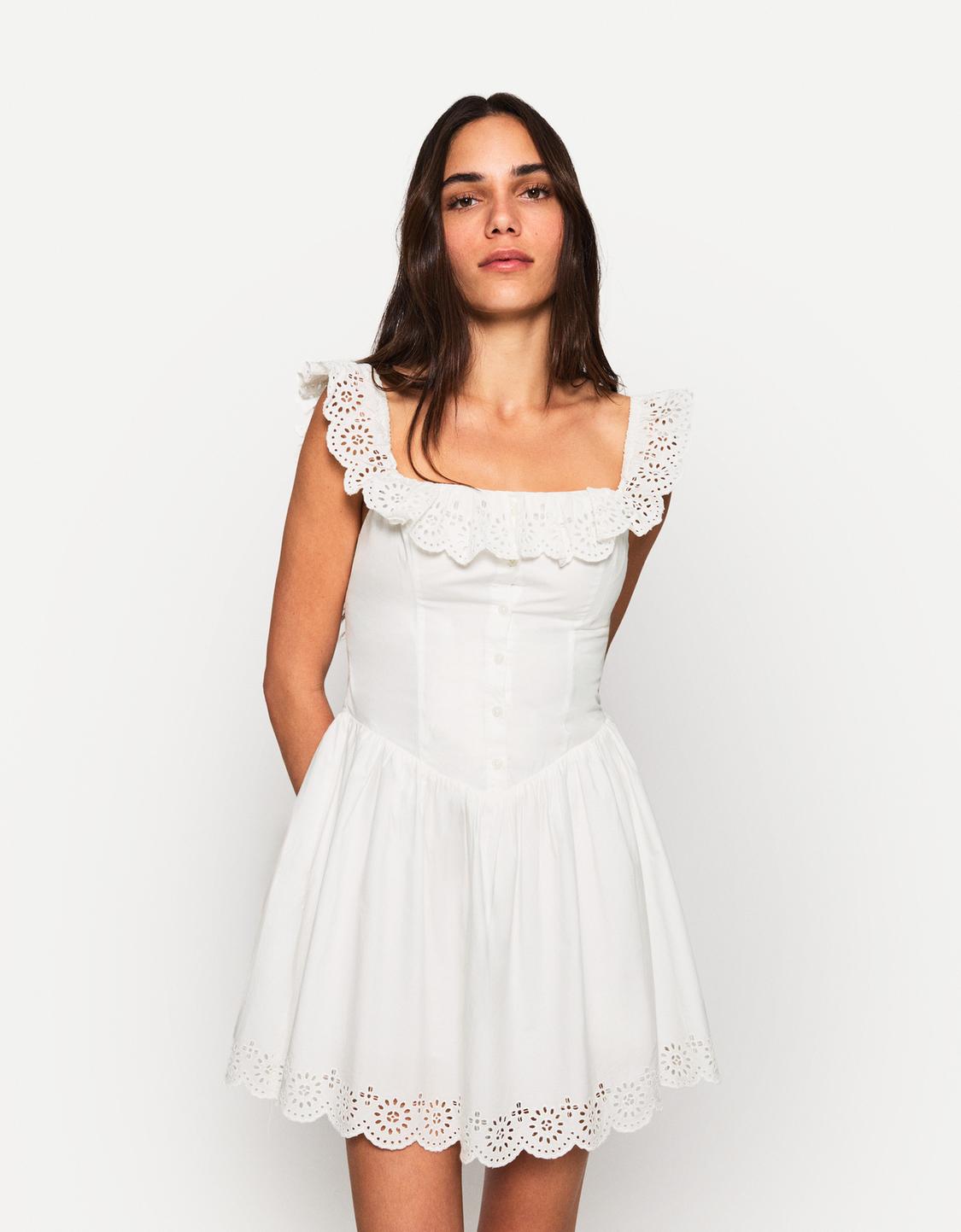Fitted mini dress with ruffles