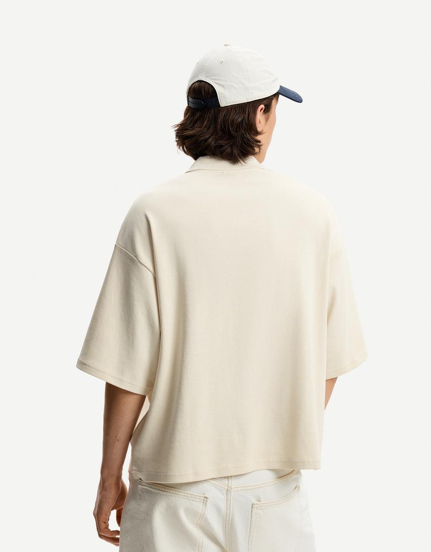 Polo màniga curta oversize print-Cru