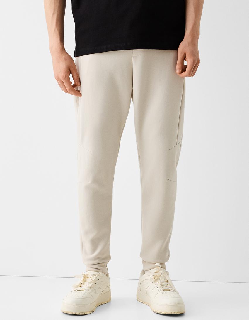 Calças jogger felpa cortes-Gelo-1