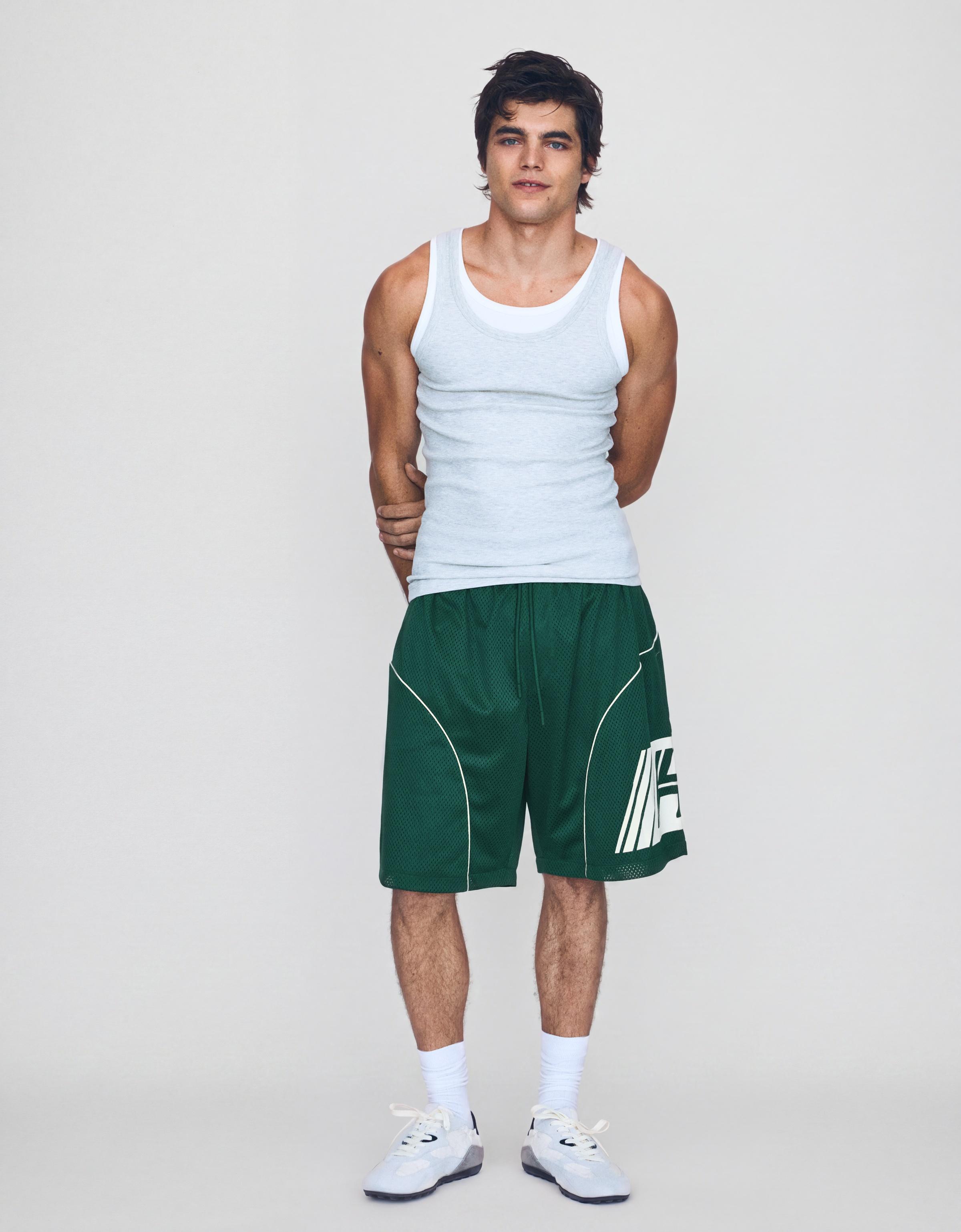 Contrast print mesh Bermuda shorts — Green