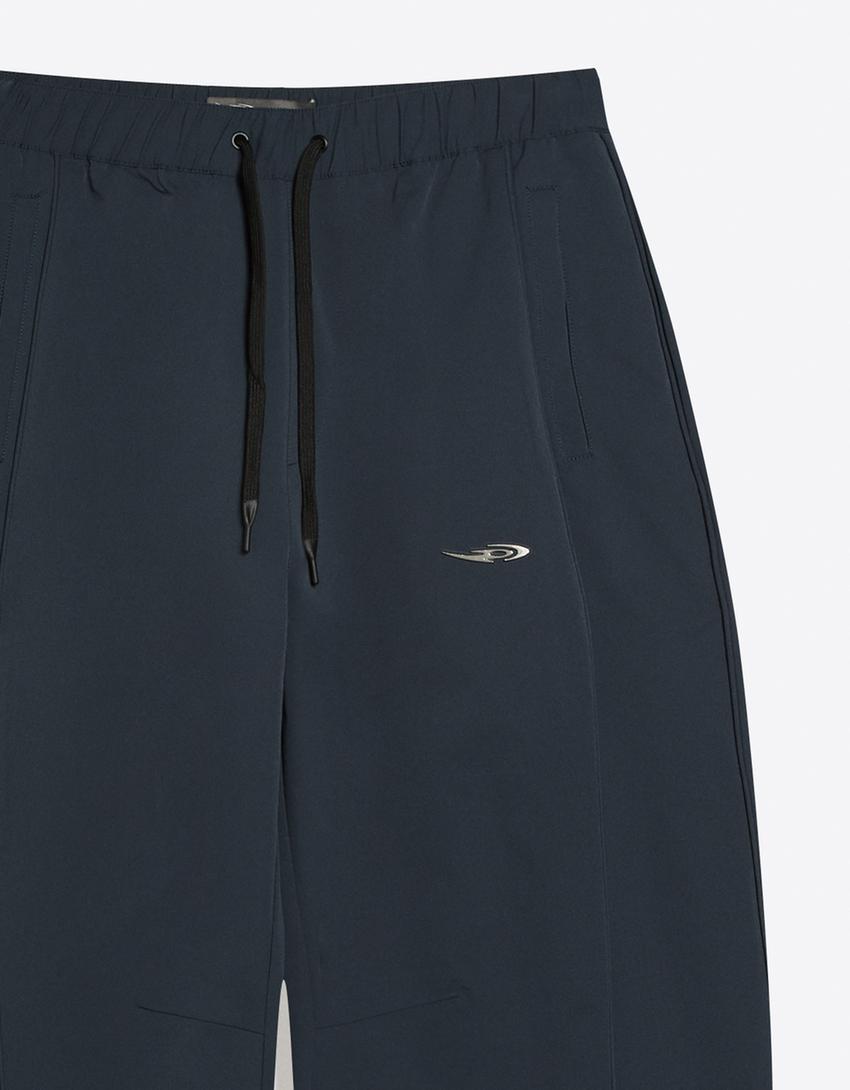 Calça barrel técnica OUT OF CORE-Azul-escuro