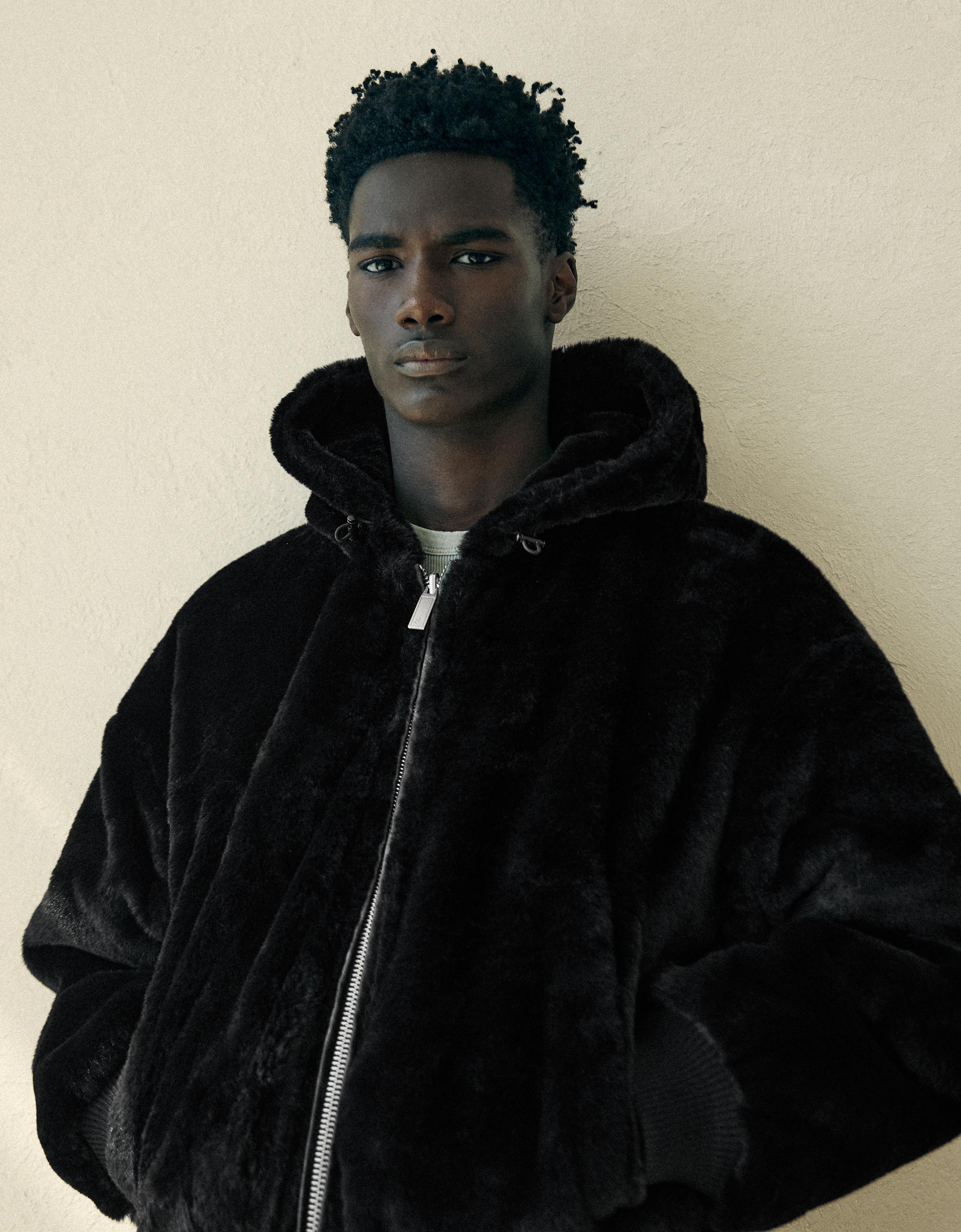 Reversible faux fur hooded jacket — Black
