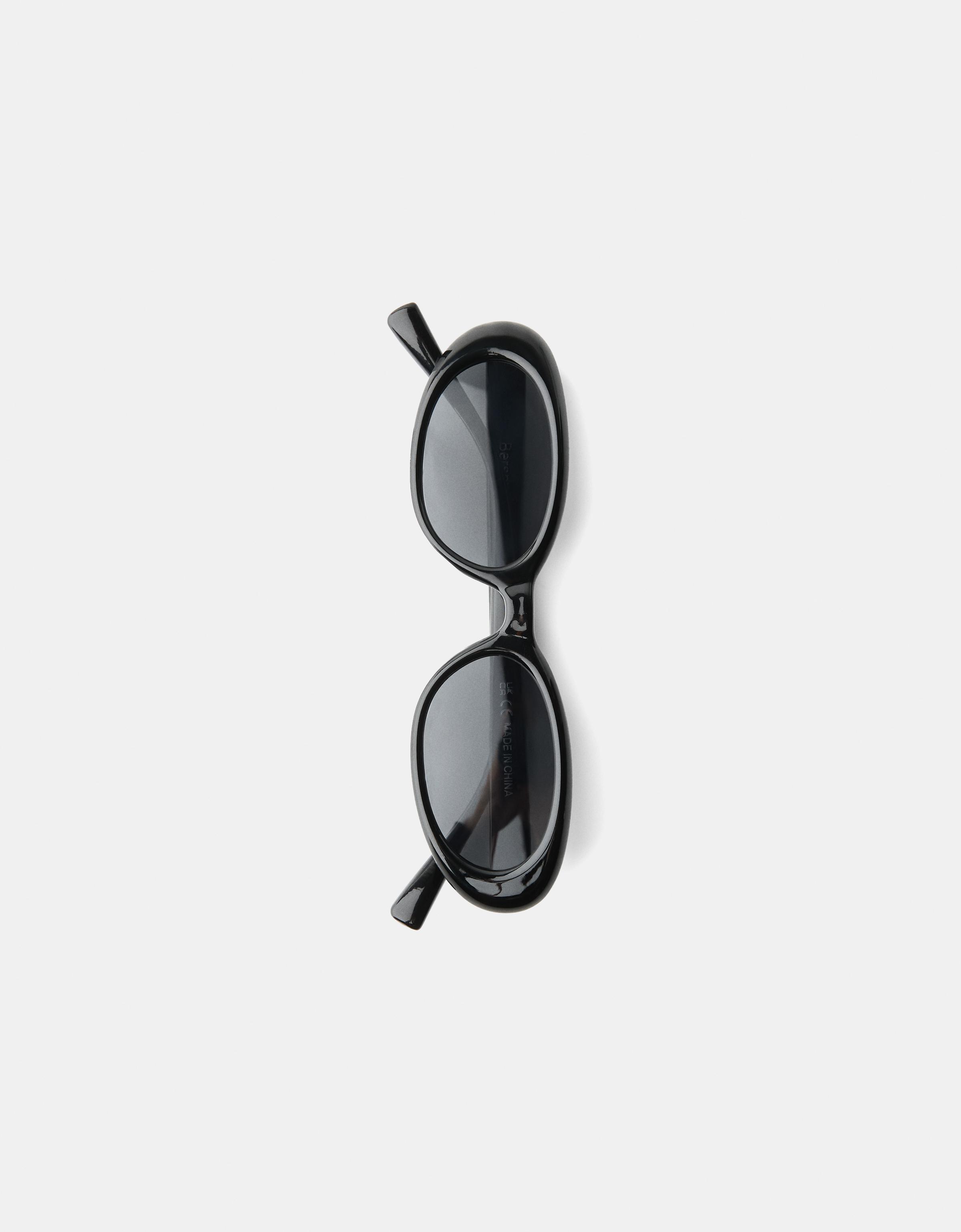 Oval plastic sunglasses — Black