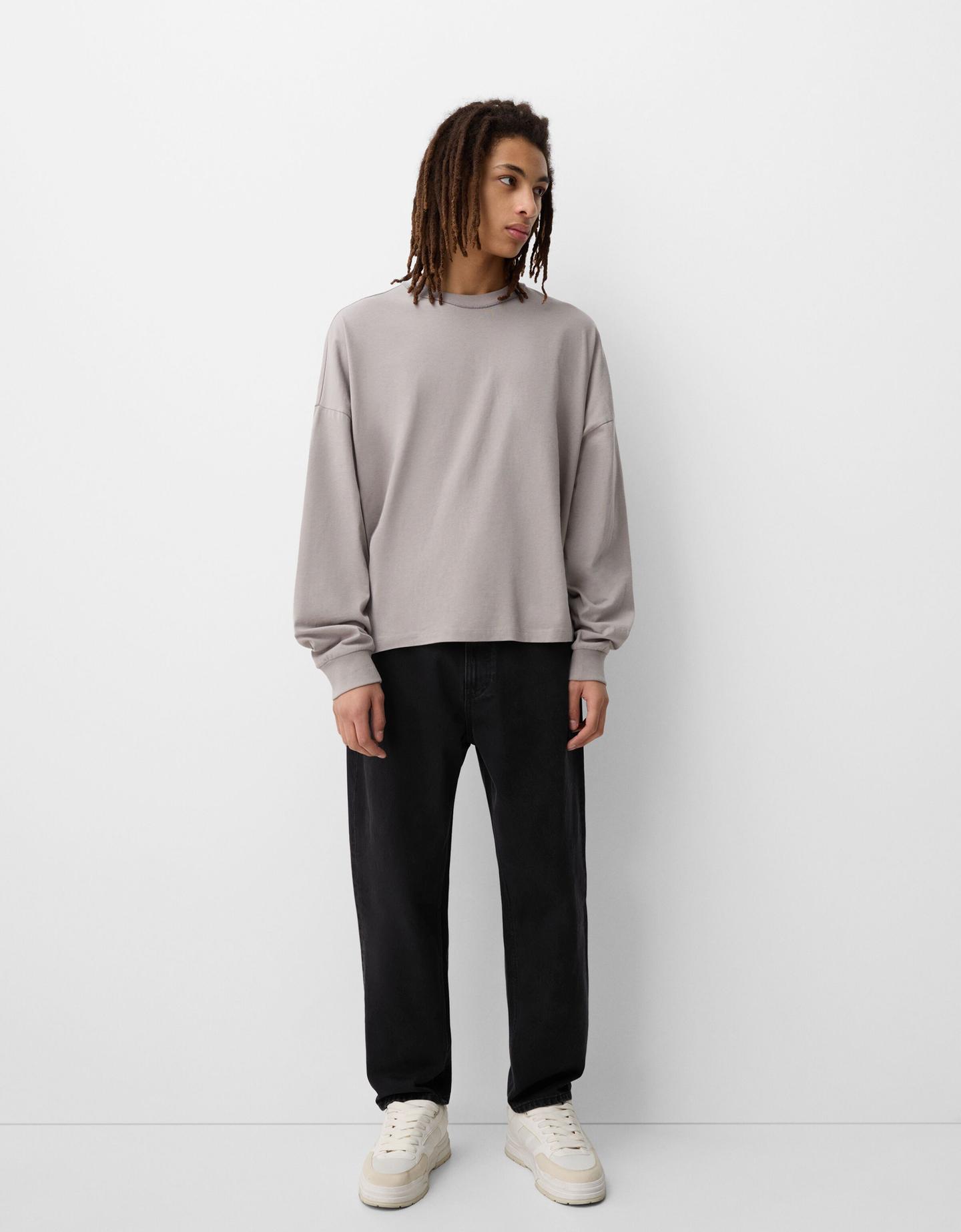 Bershka jeansy o kroju baggy czarny