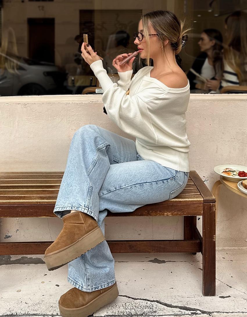 سويتر غير متماثل بطرف سفلي مضلع-كريمي