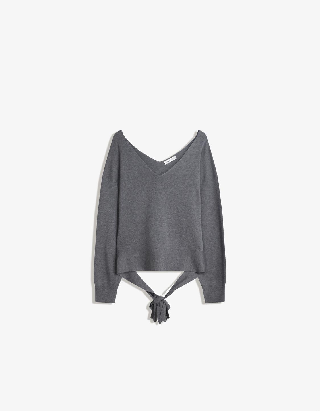 V-neck sweater with tie detail