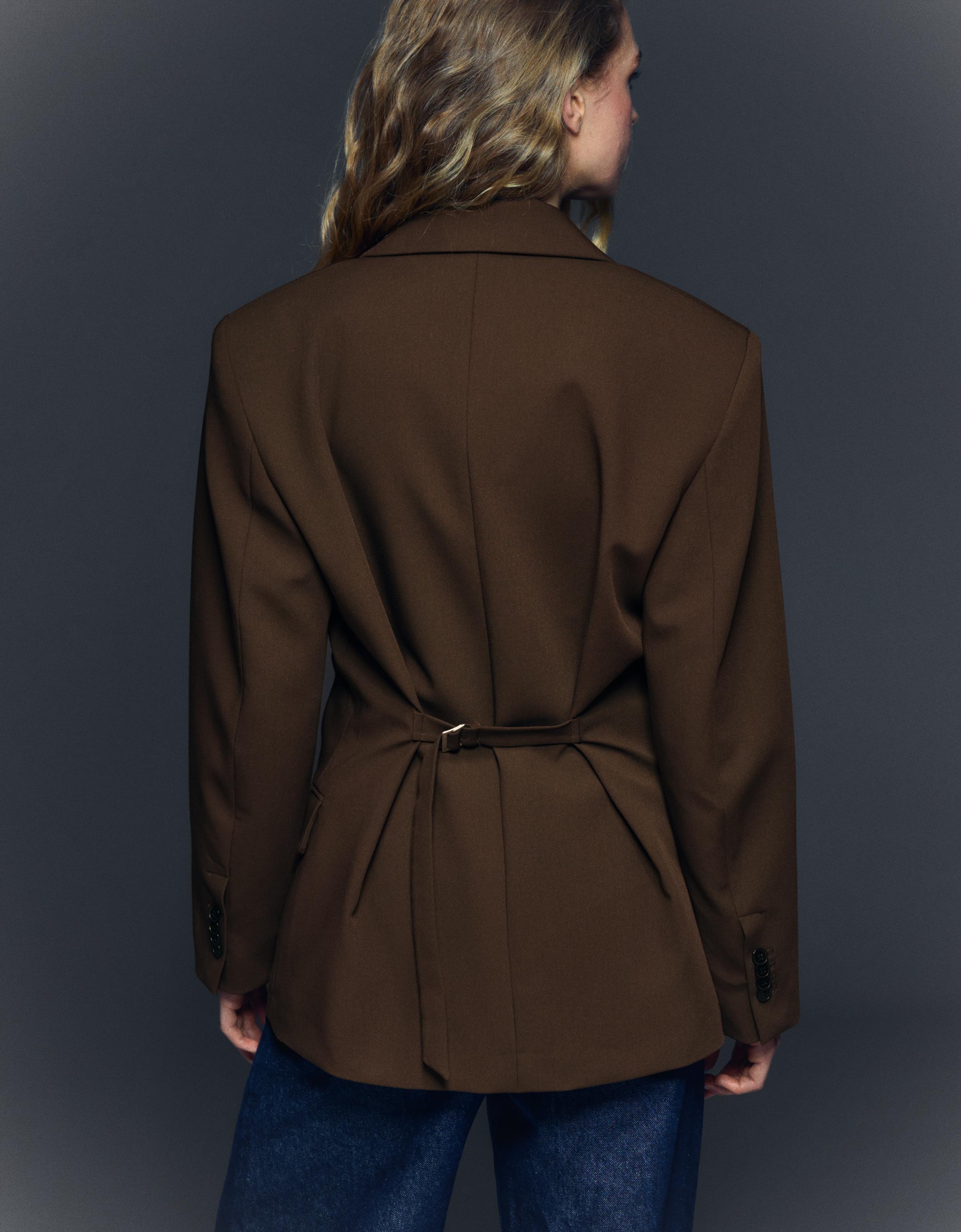 Blazer with back buckle