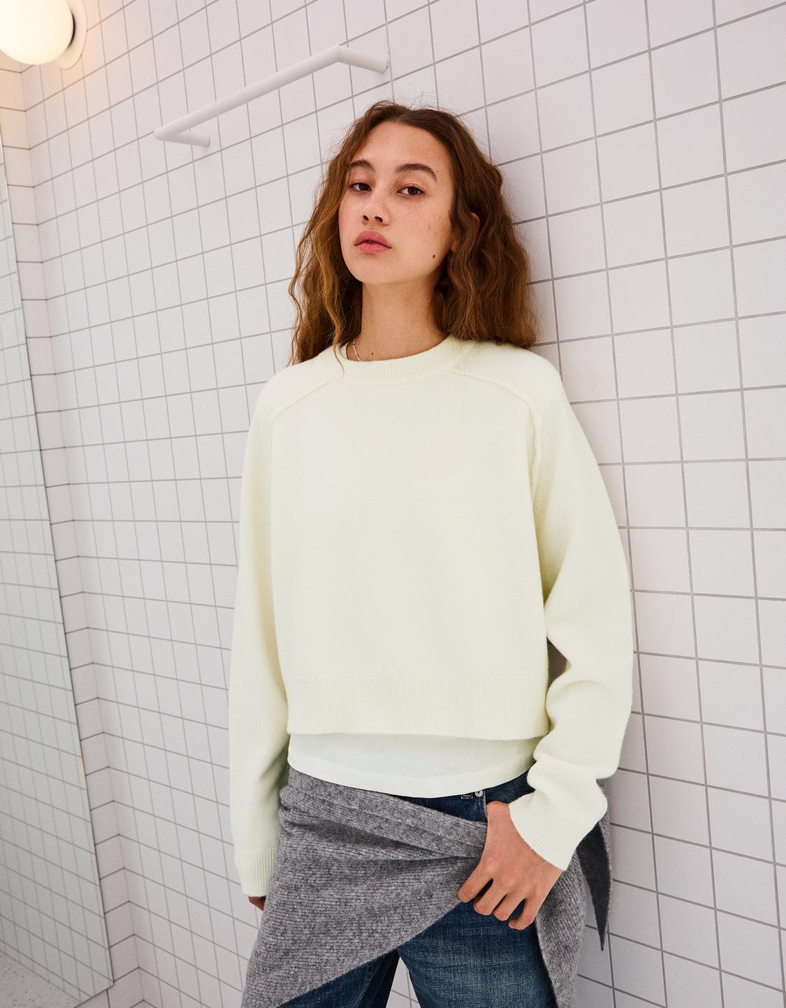 Pull en maille à coutures