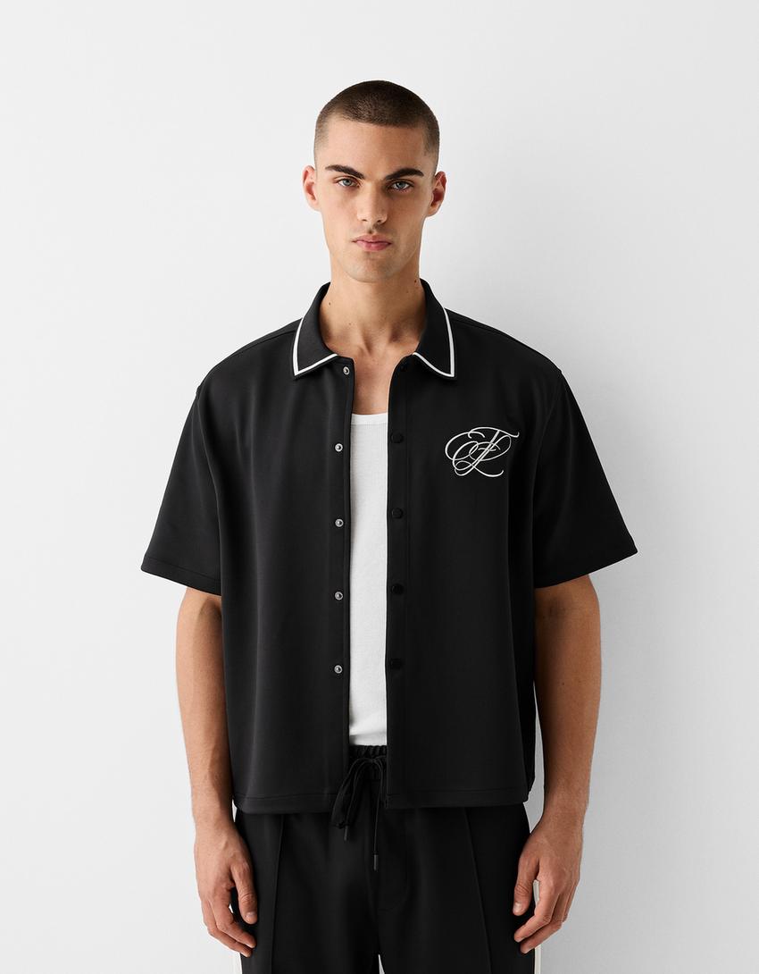 Short sleeve shirt with interlocking detail-Black