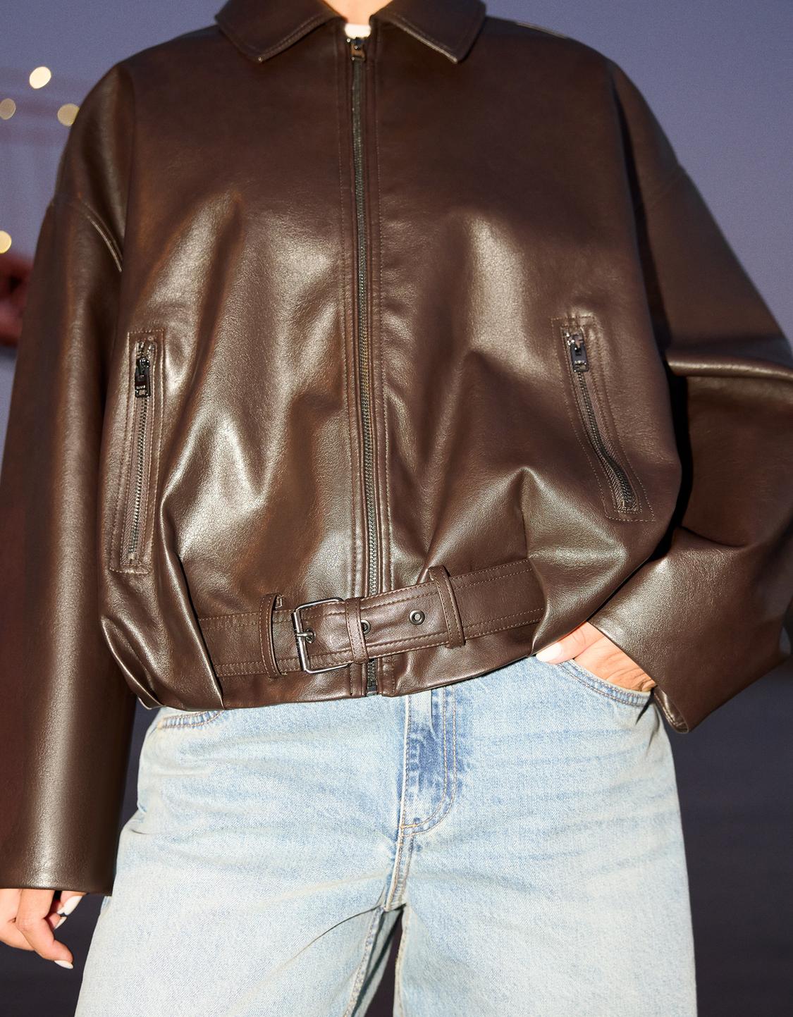 Belted faux leather jacket
