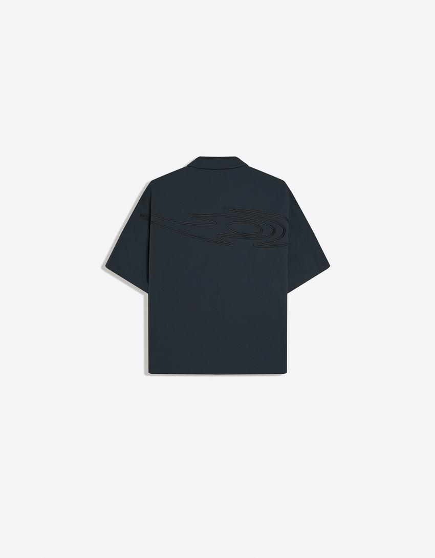 Camisa manga curta técnica OUT OF CORE-Azul-escuro
