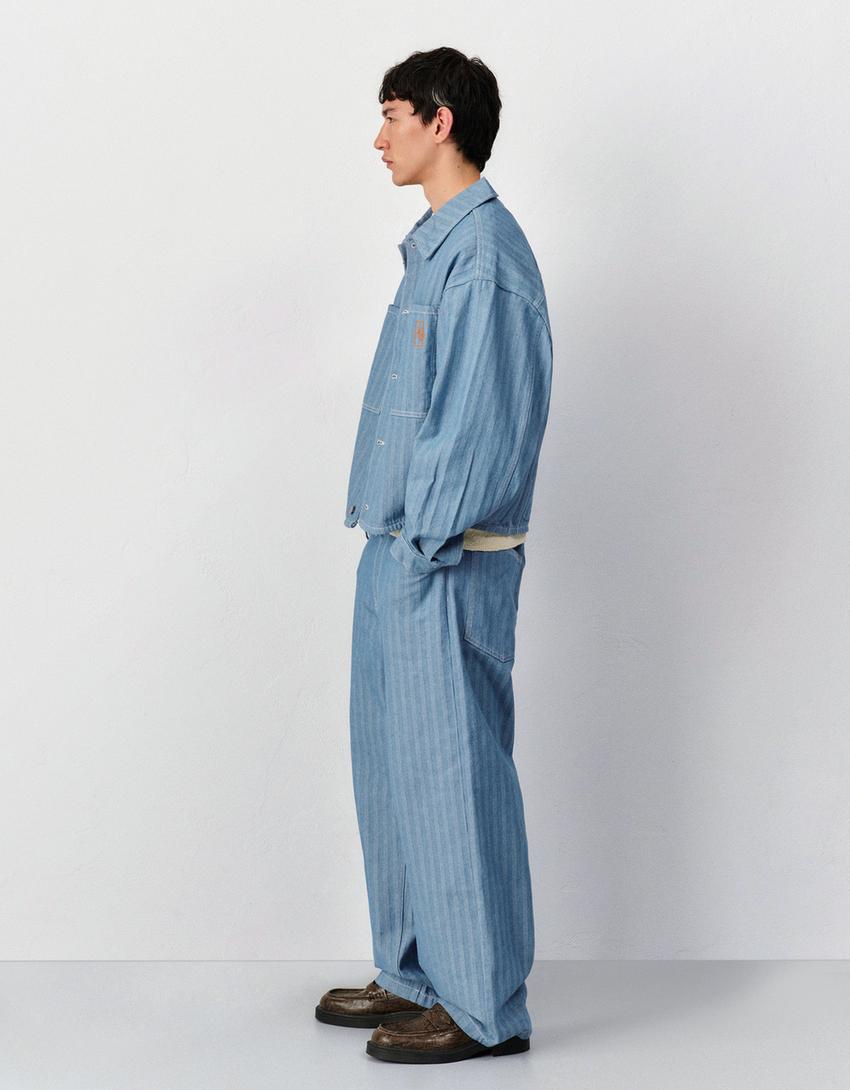 Pruhované super vrecovité džínsy