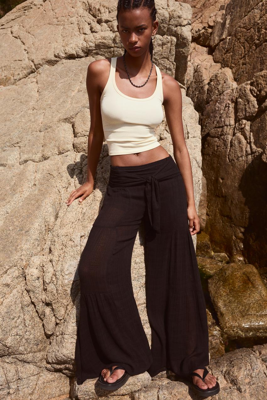 بنطال واسع الساقين بملمس بارز-أسود