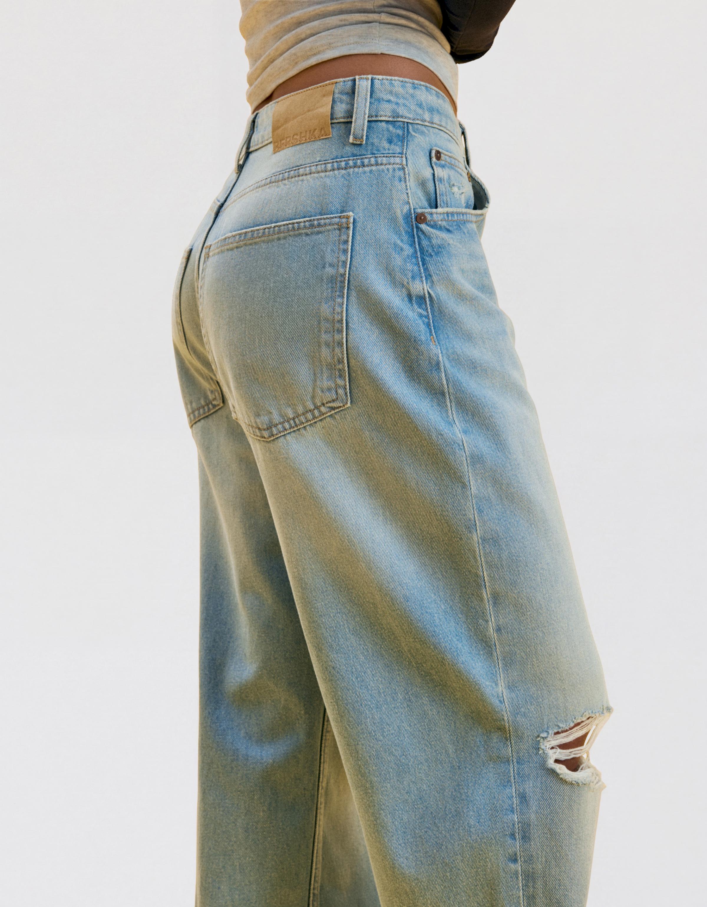 Ripped barrel loose jeans — Light blue