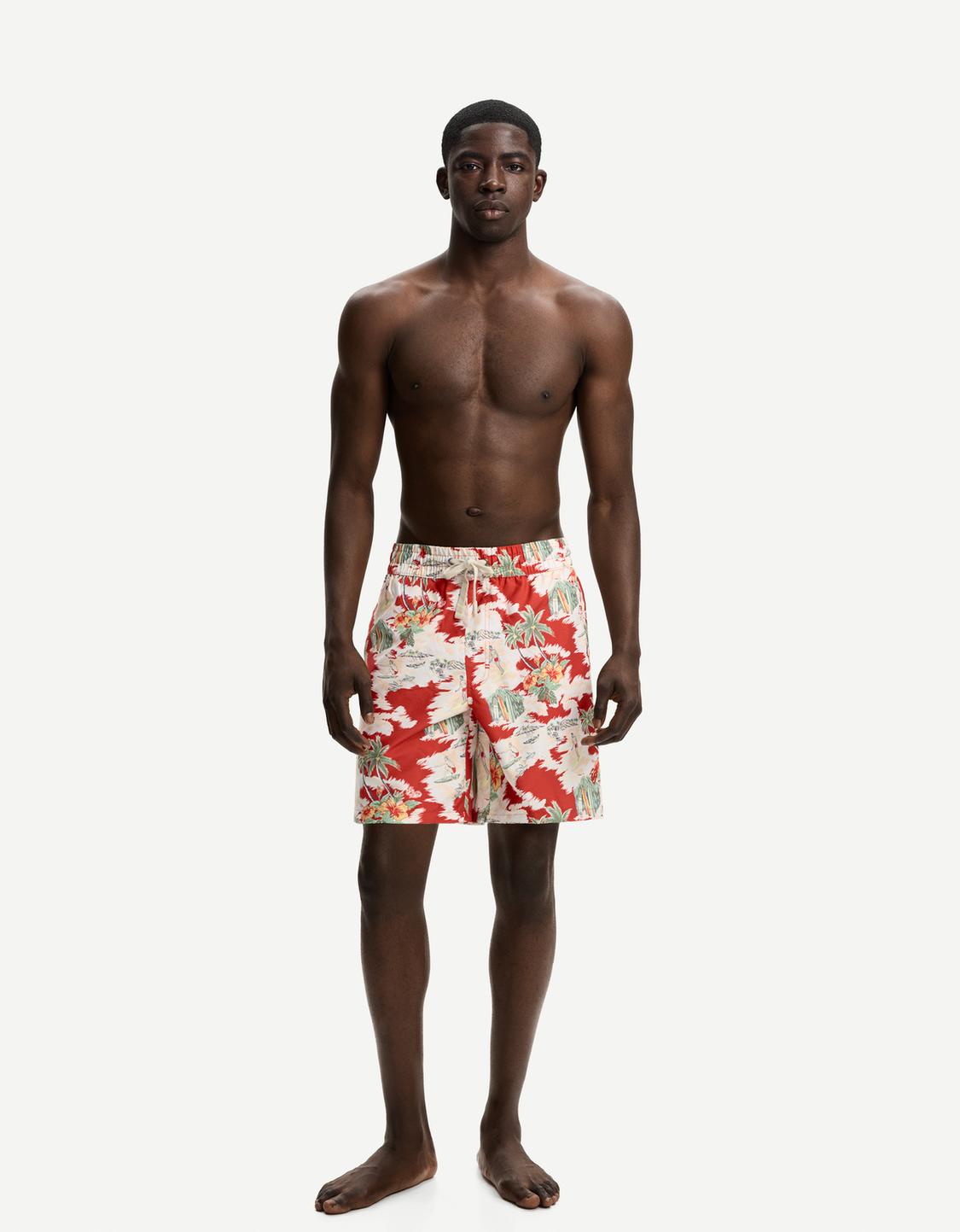 Long tropical print swimming trunks