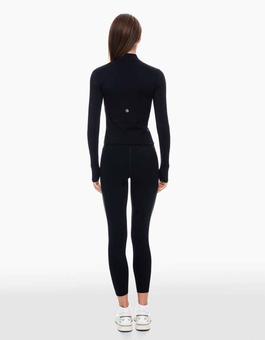 Sneldrogende en ademende sweater met rits-Zwart