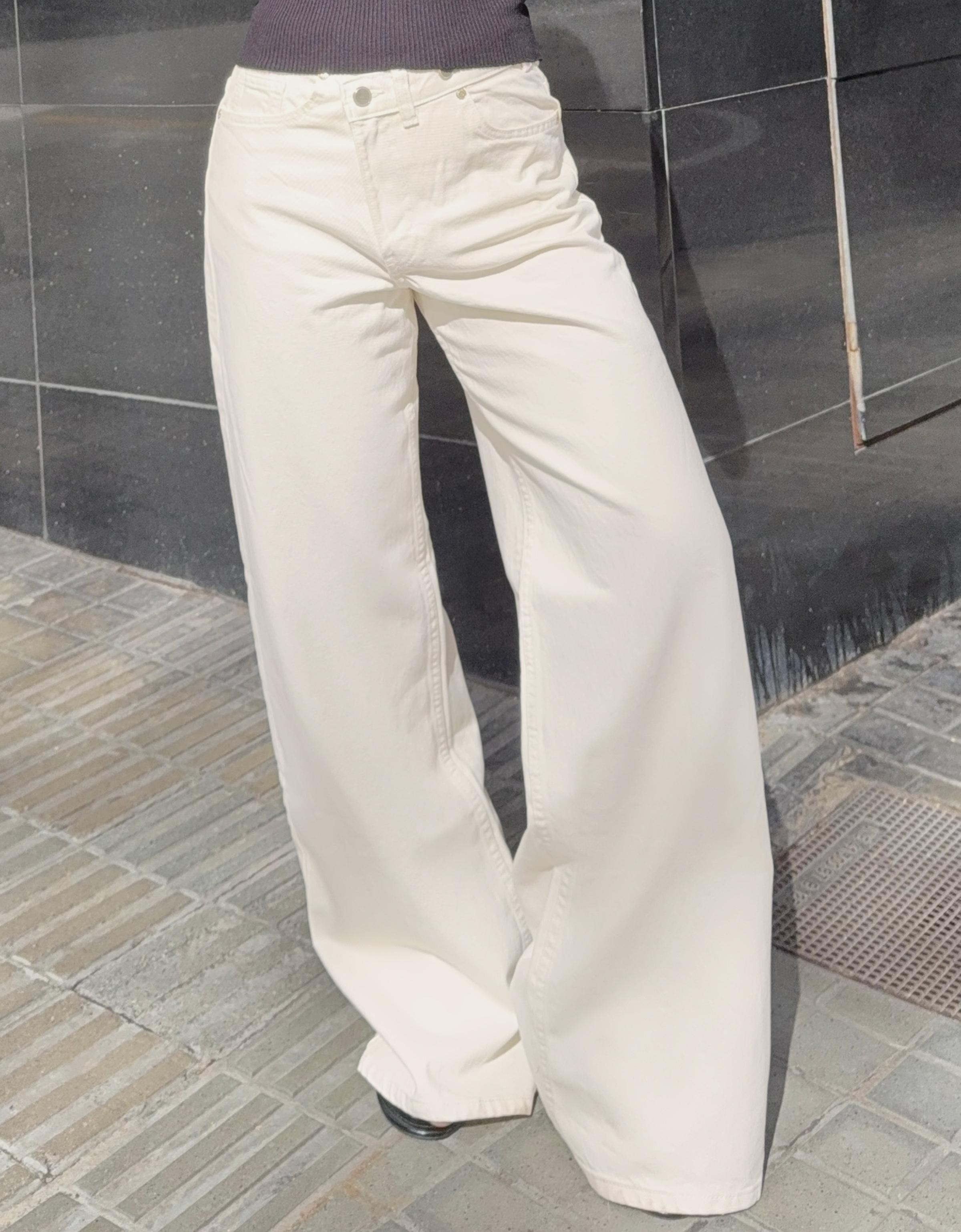 Wide leg jeans with crossover waist — Cream