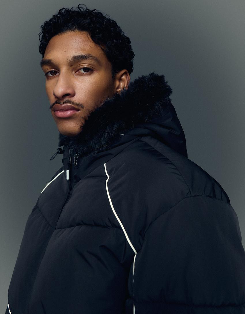 Cazadora técnica capucha efecto pelo