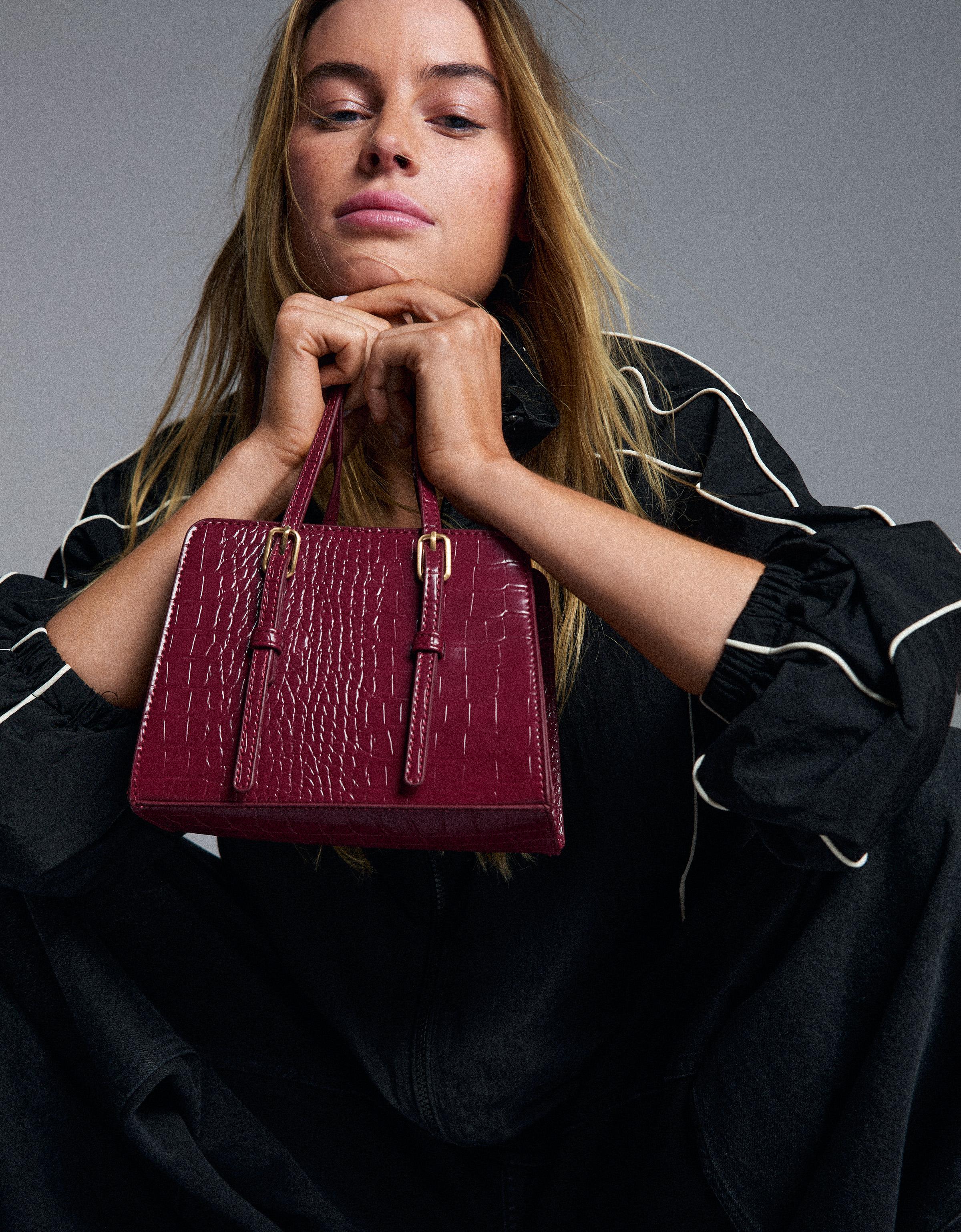 Textured box bag with buckles — Burgundy