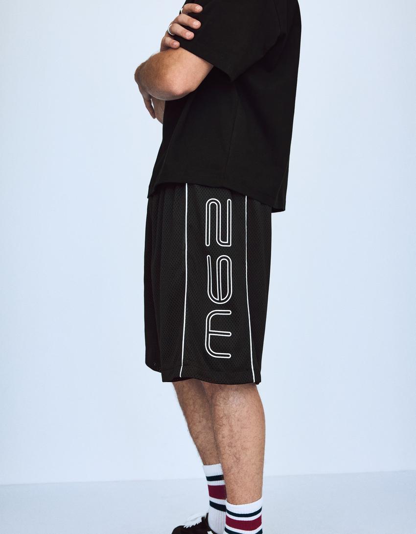 Bermuda mesh contraste print-Negro