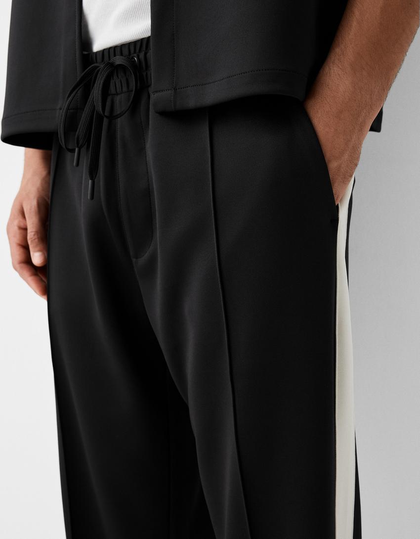 سروال إنترلوك بخطوط جانبية-أسود-5