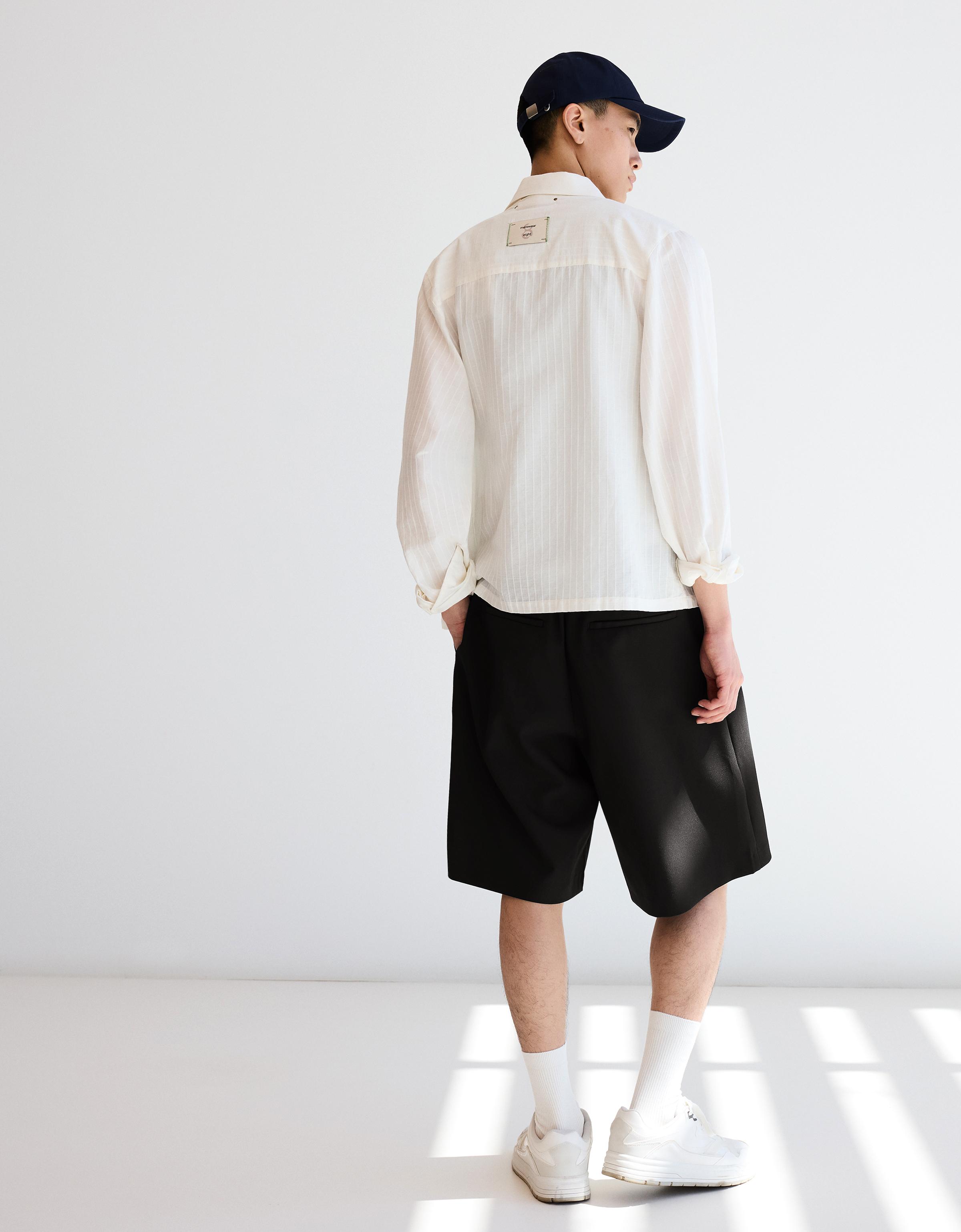 Wide-leg Bermuda shorts with belt — Black
